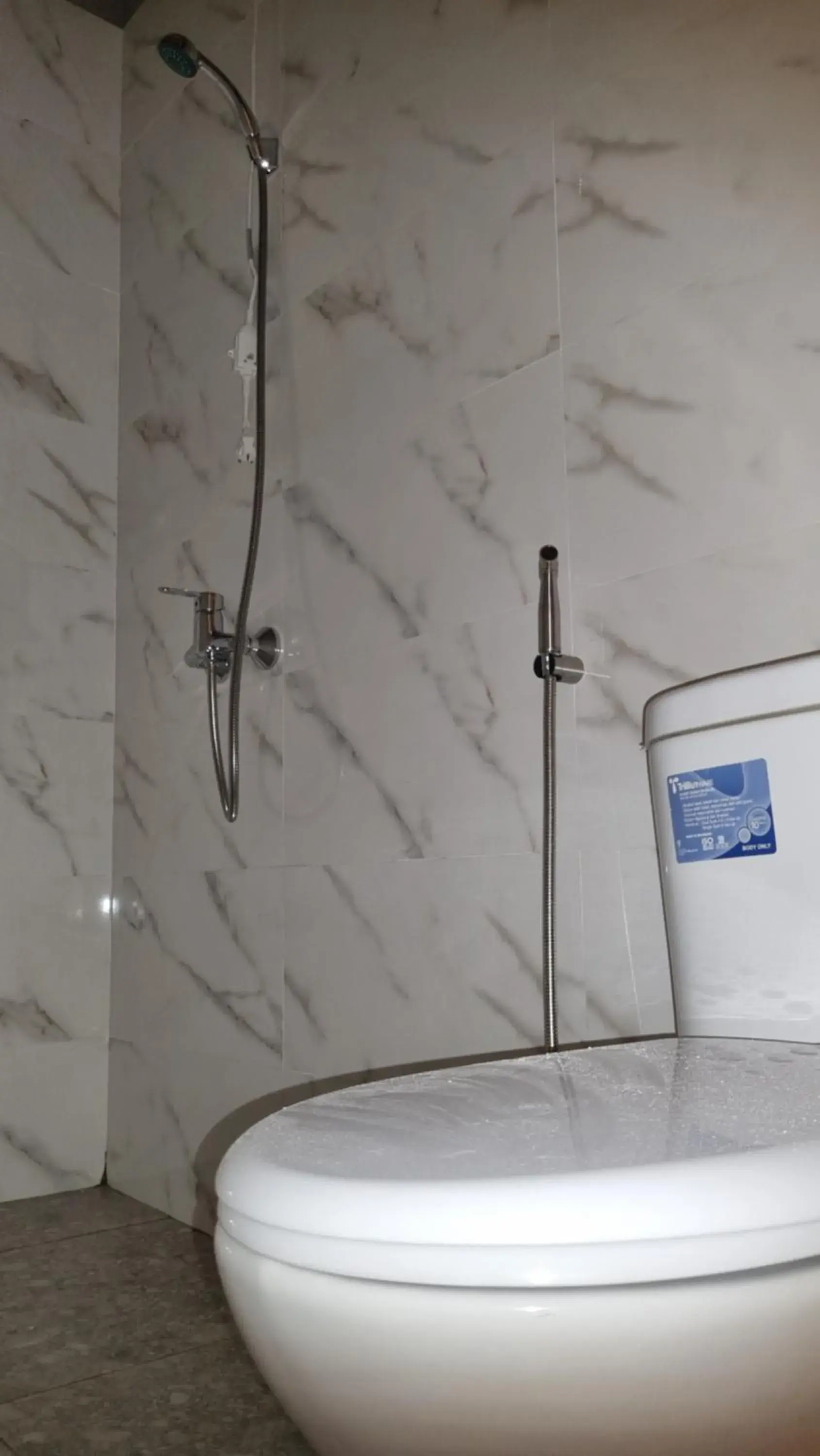 Luxury Quadruple Room in Uni Inn Semarang - Gunung Pati Luxury Quadruple Room in Uni Inn Semarang - Gunung Pati