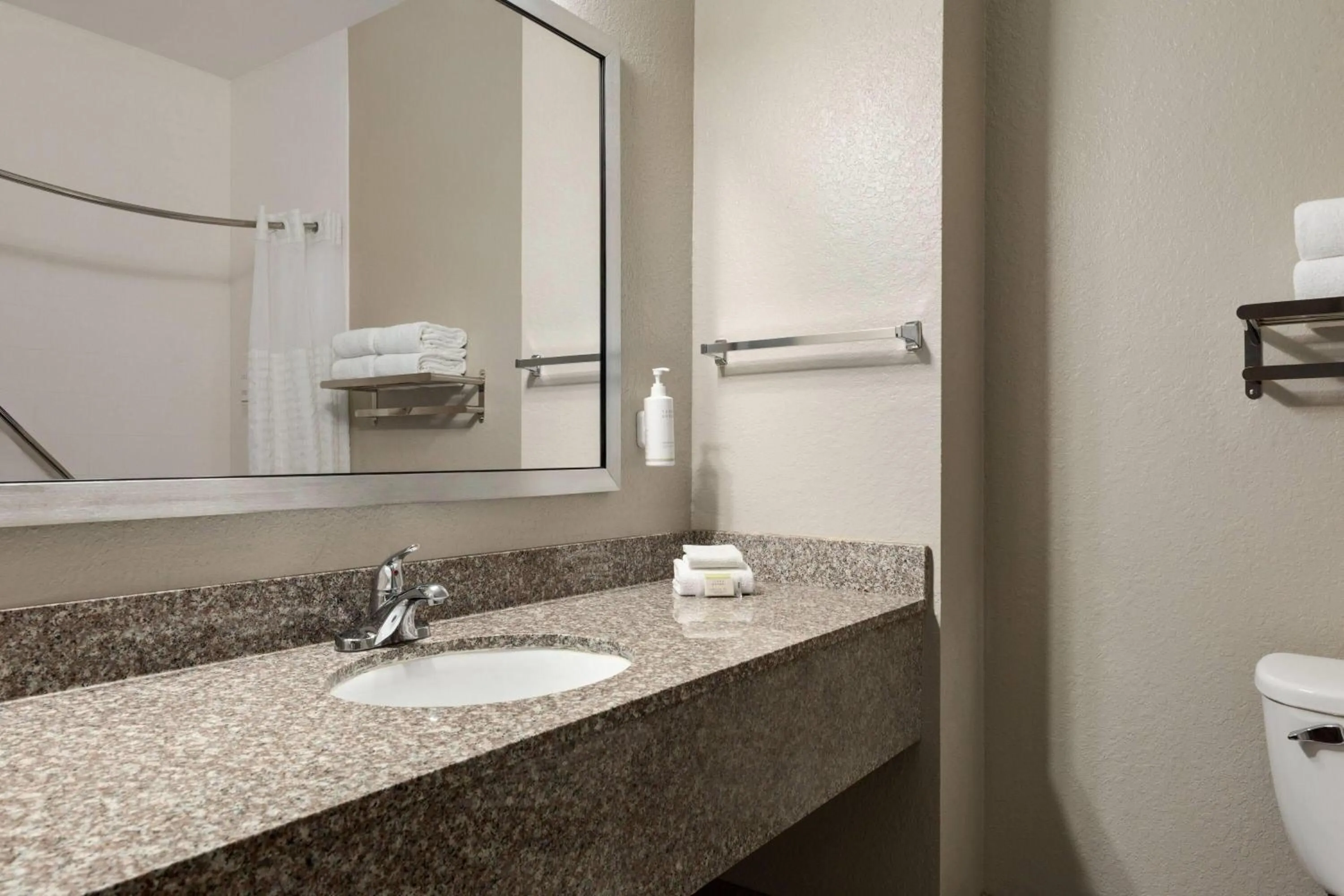 Bathroom in Days Inn & Suites by Wyndham Prattville-Montgomery