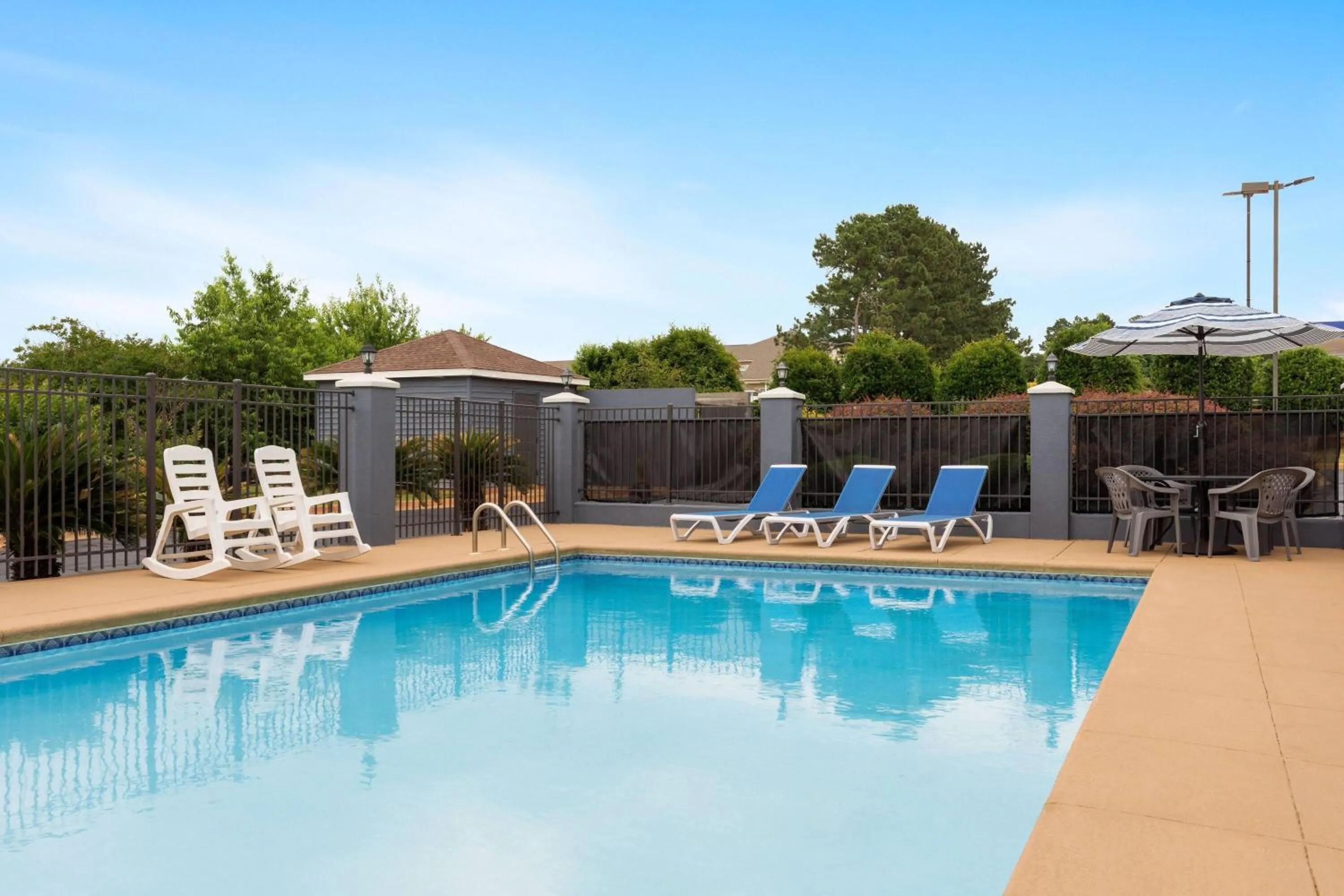 Pool view in Days Inn & Suites by Wyndham Prattville-Montgomery