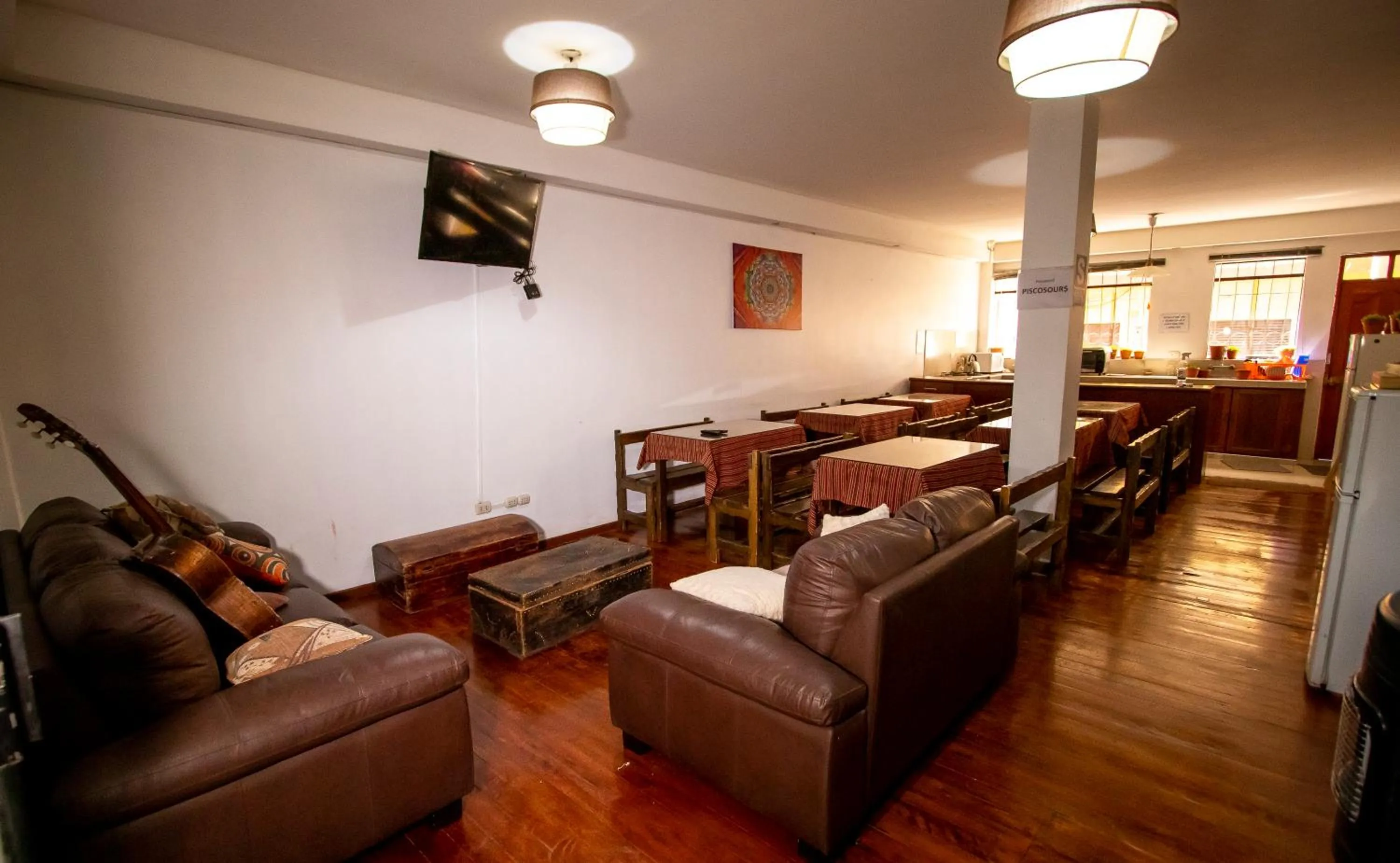 Communal lounge/ TV room in Inka's Rest Hostel