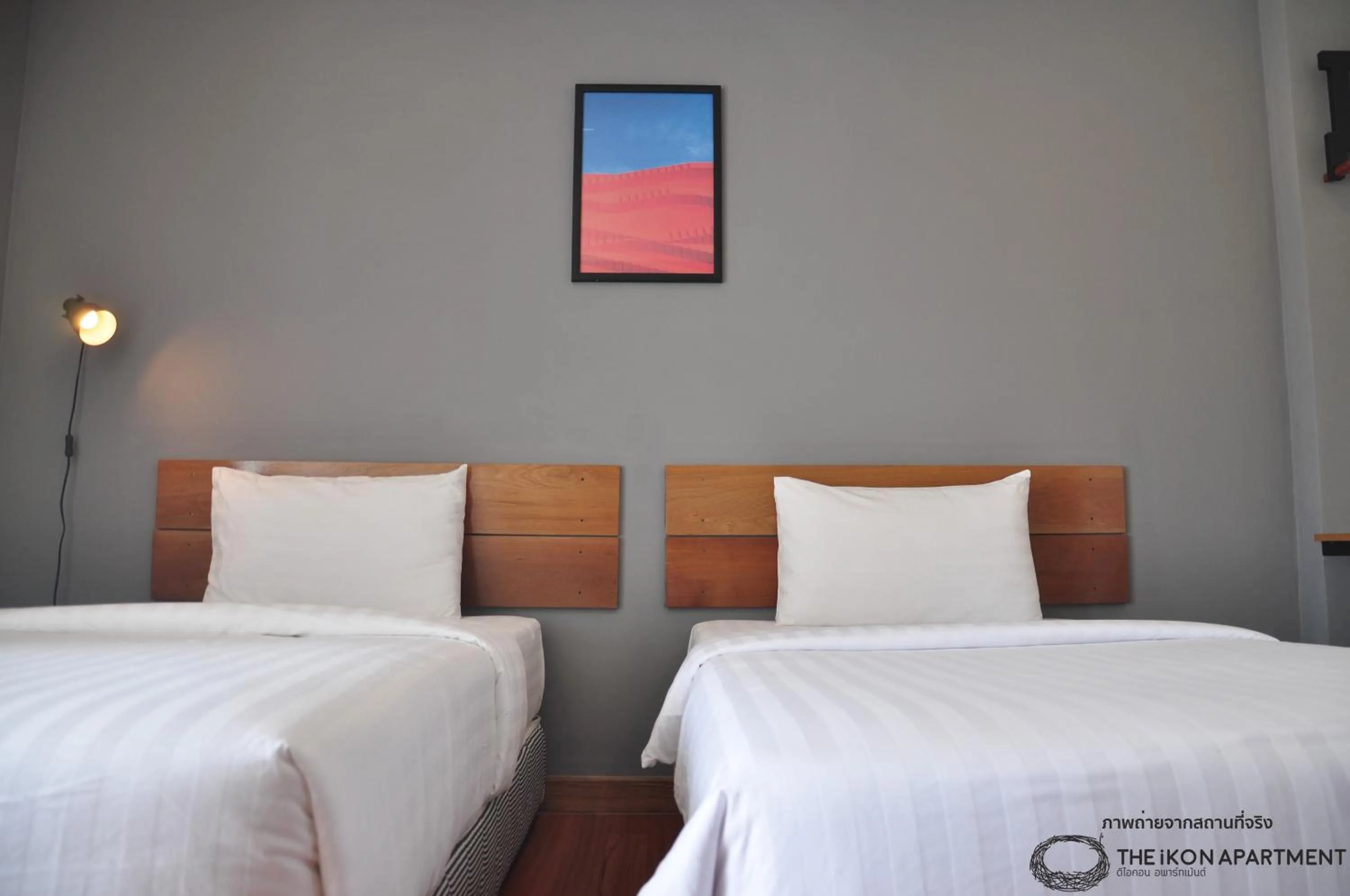 Bed in The iKon Apartment