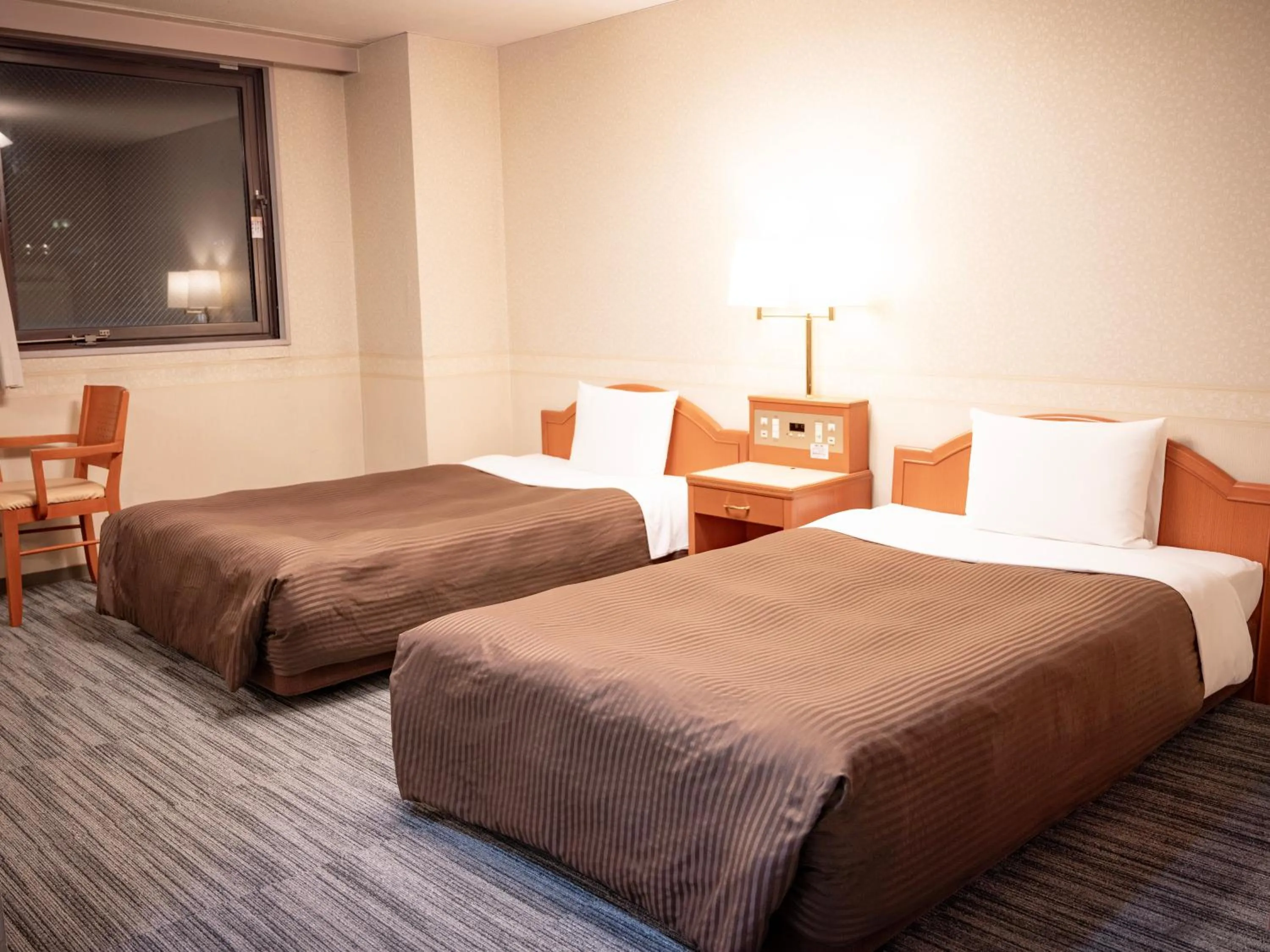 Photo of the whole room, Bed in Numazu Grand Hotel