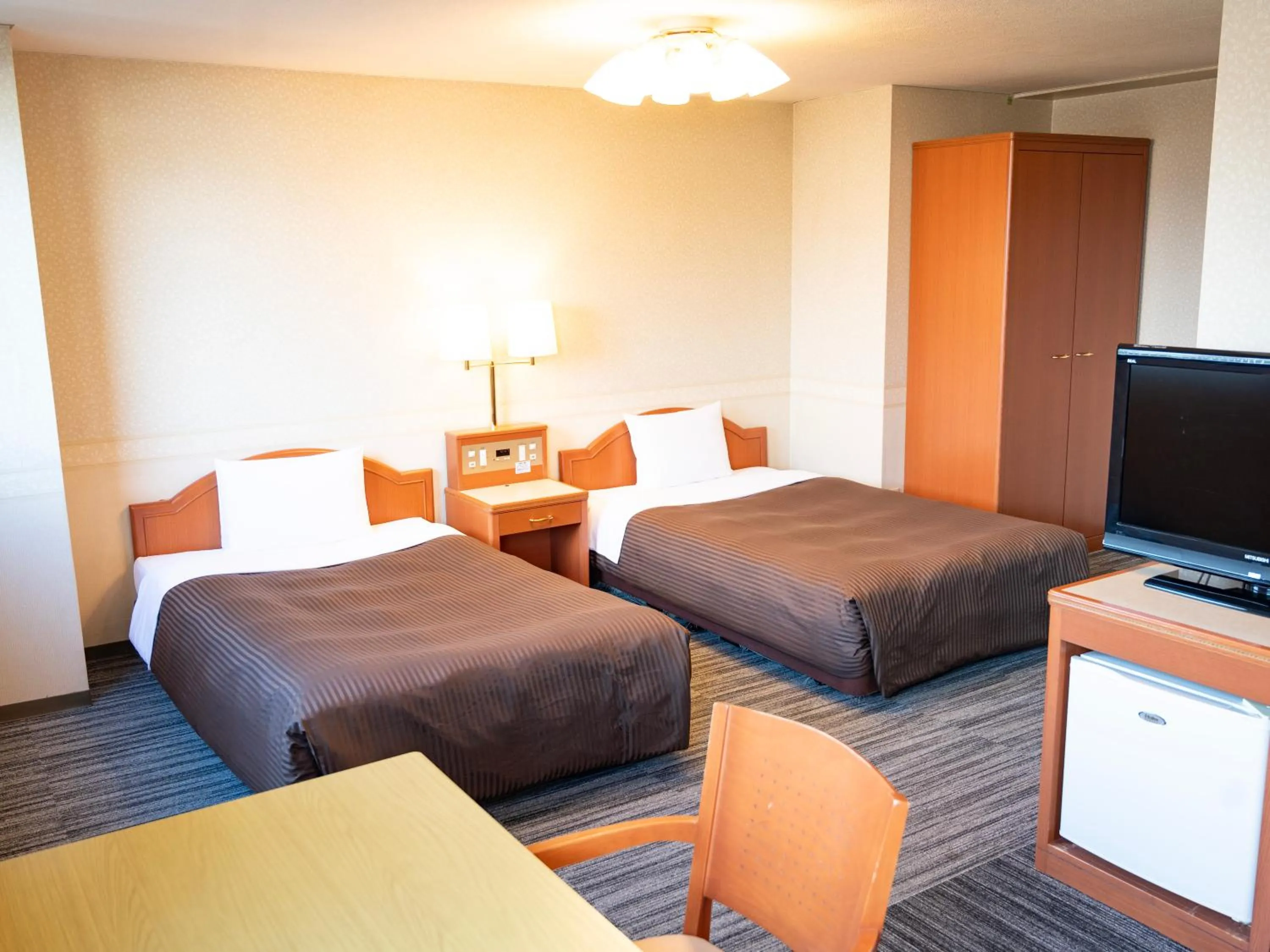 Photo of the whole room, Bed in Numazu Grand Hotel