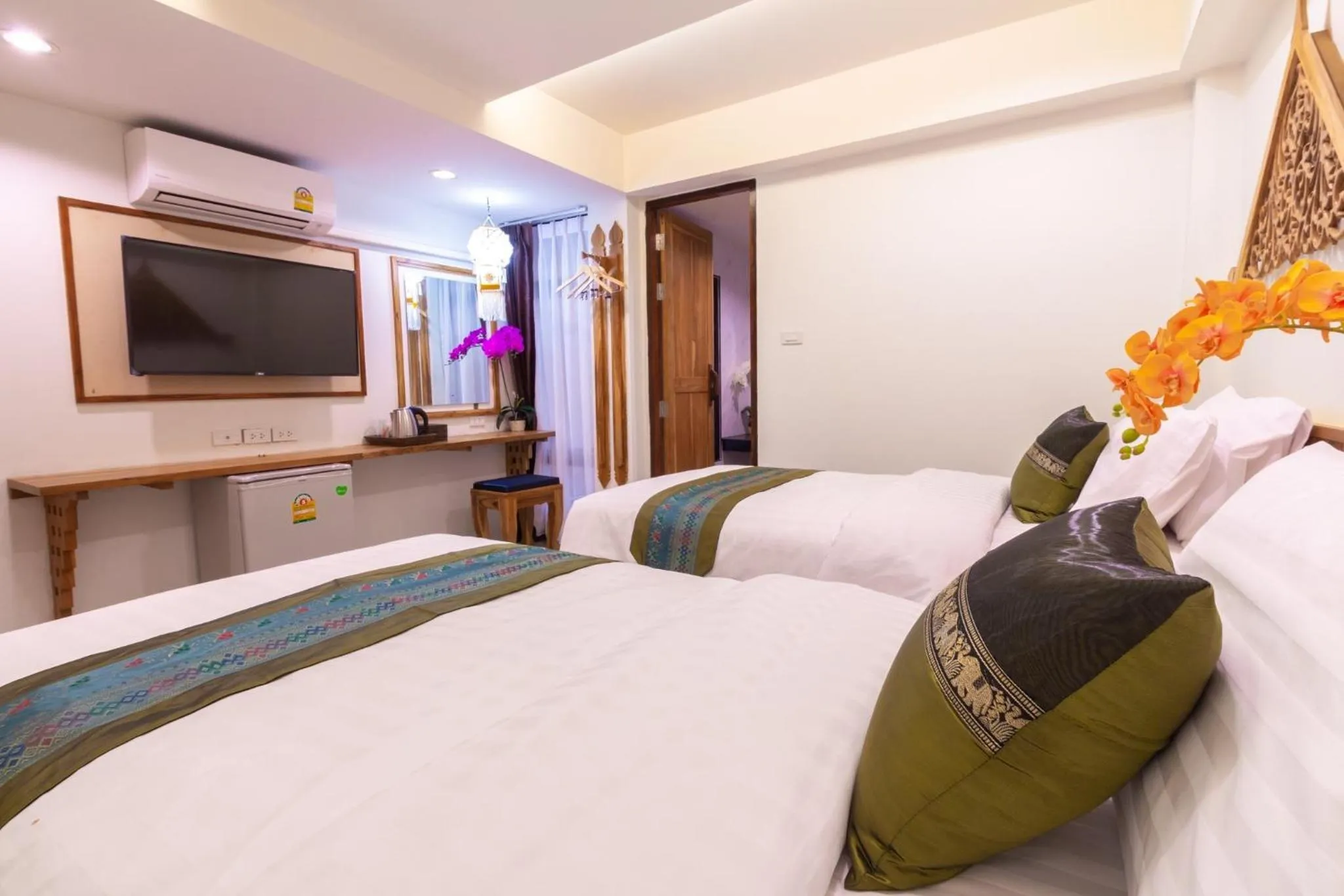 Bed in Anumat Premium Budget Hotel