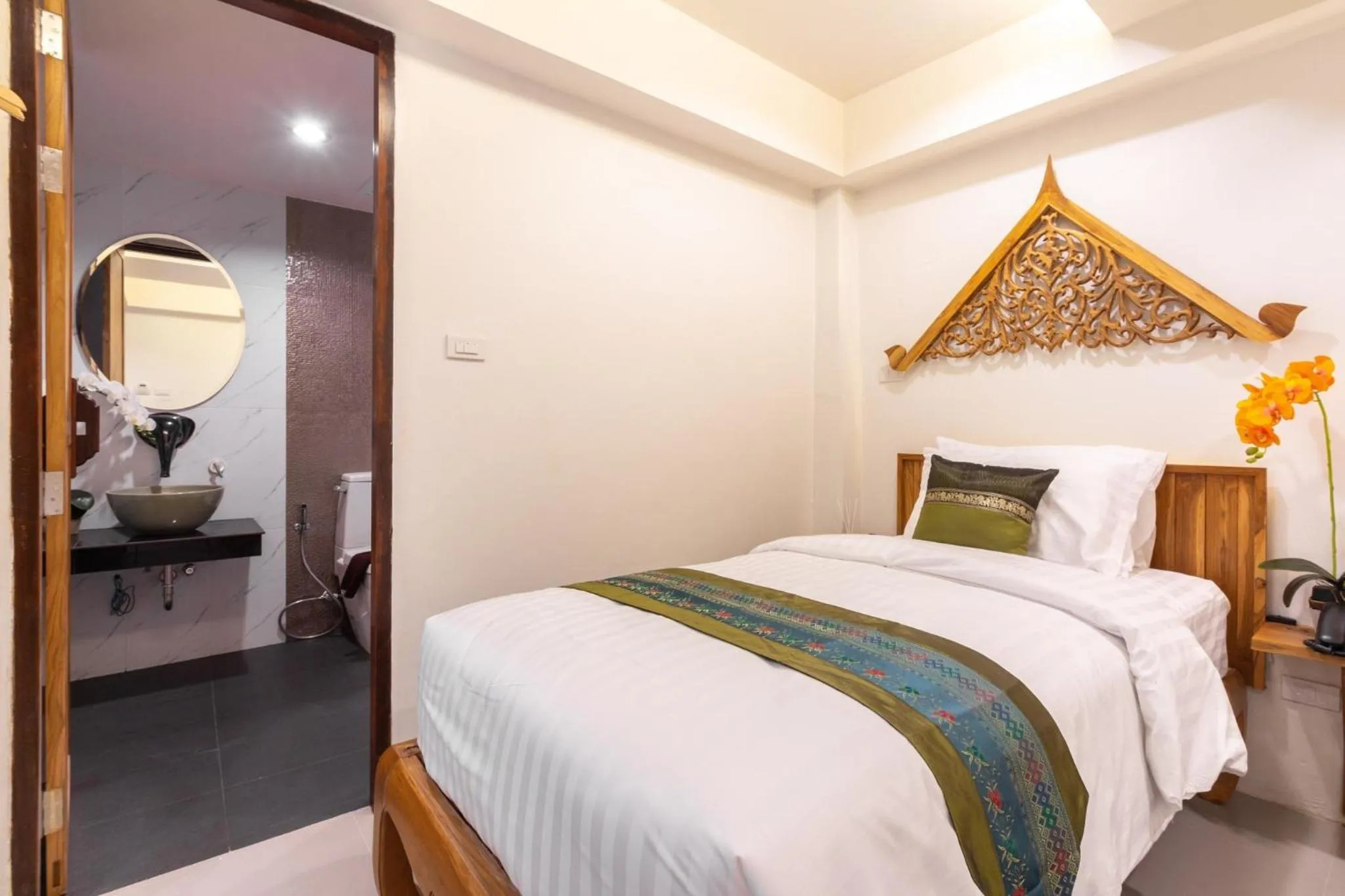 Bed in Anumat Premium Budget Hotel