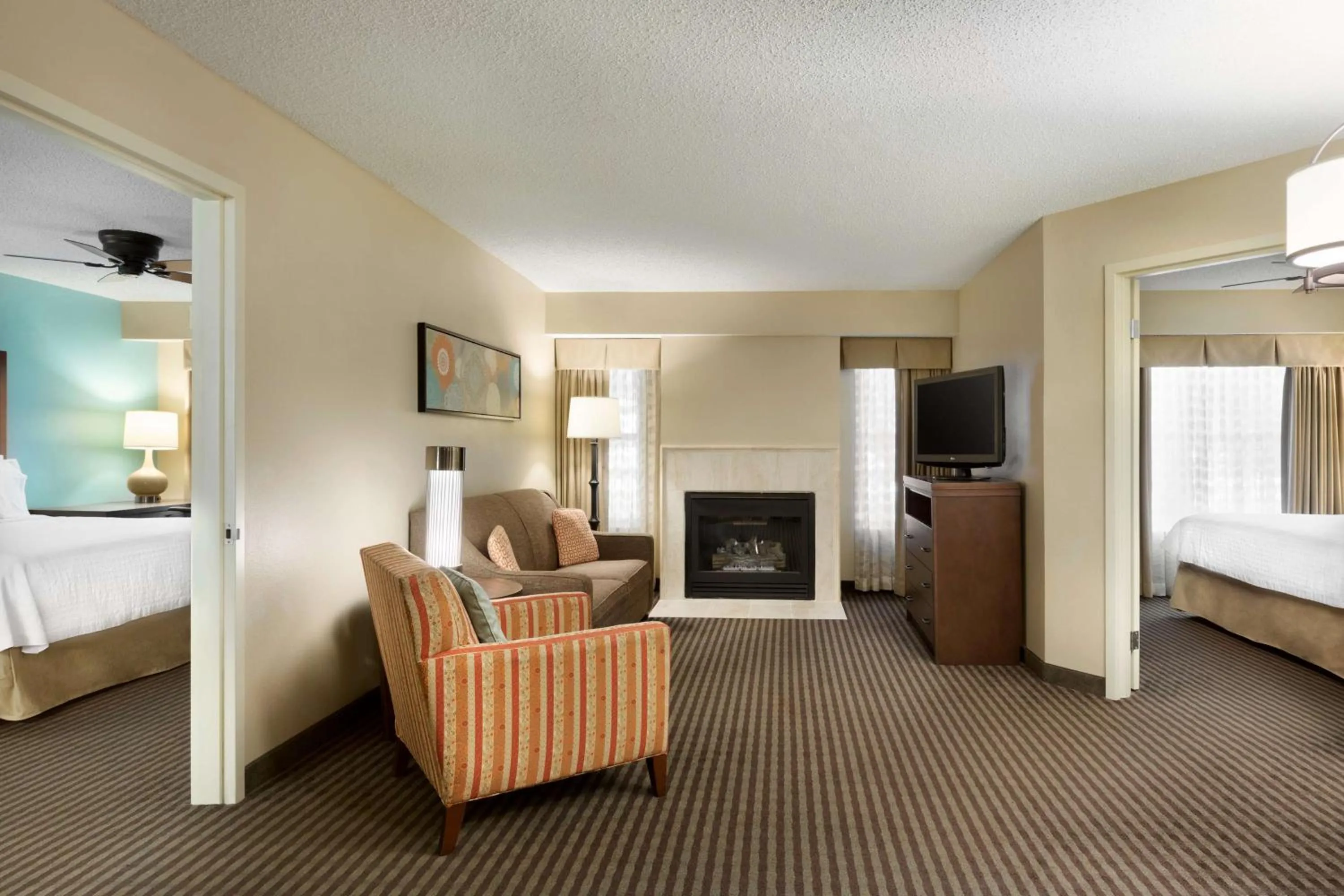 Living room, Bed in Homewood Suites by Hilton Houston-Westchase