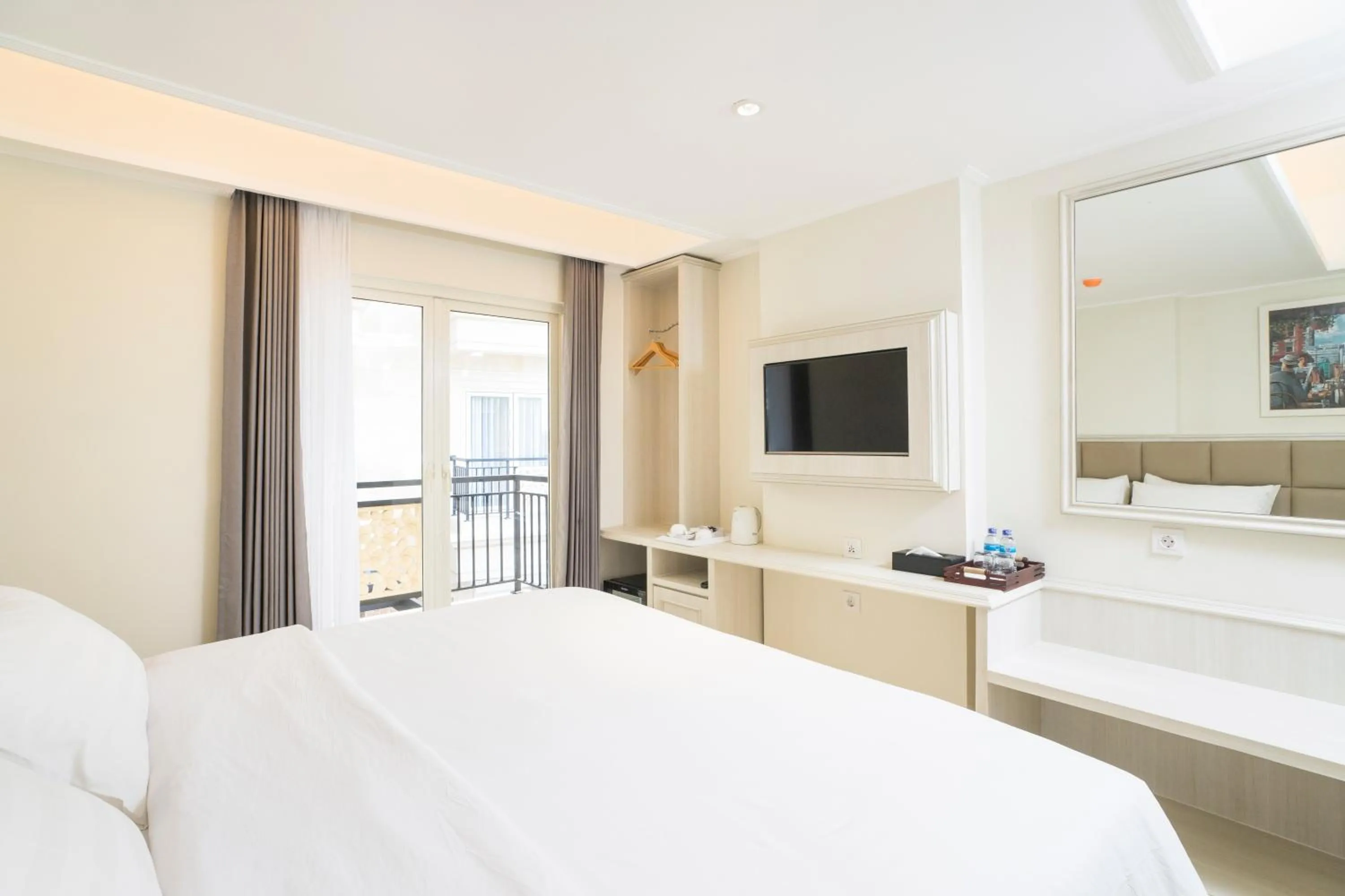 Bed in Alron Hotel Kuta Powered by Archipelago