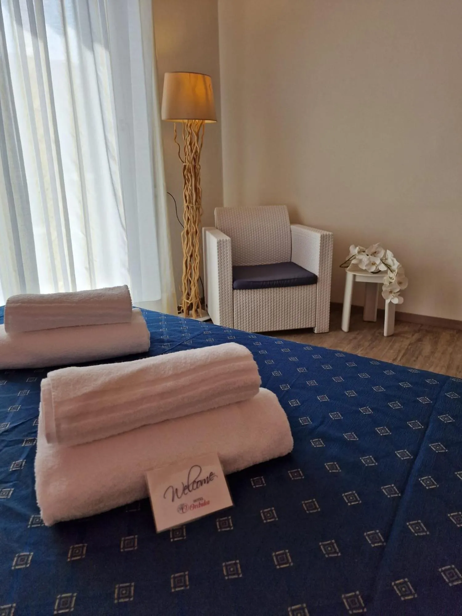 Bed in Hotel Orchidea