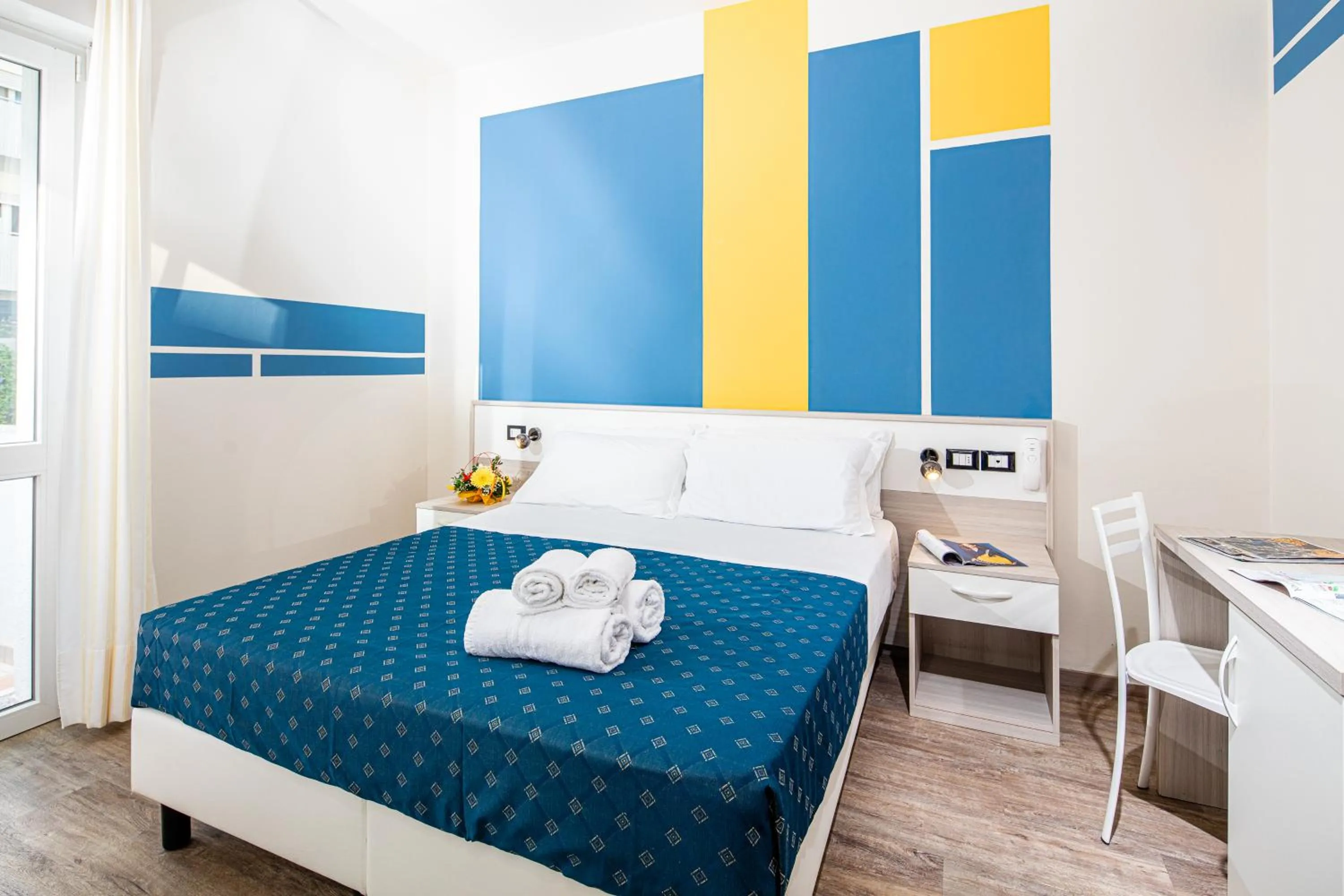 Bed in Hotel Orchidea