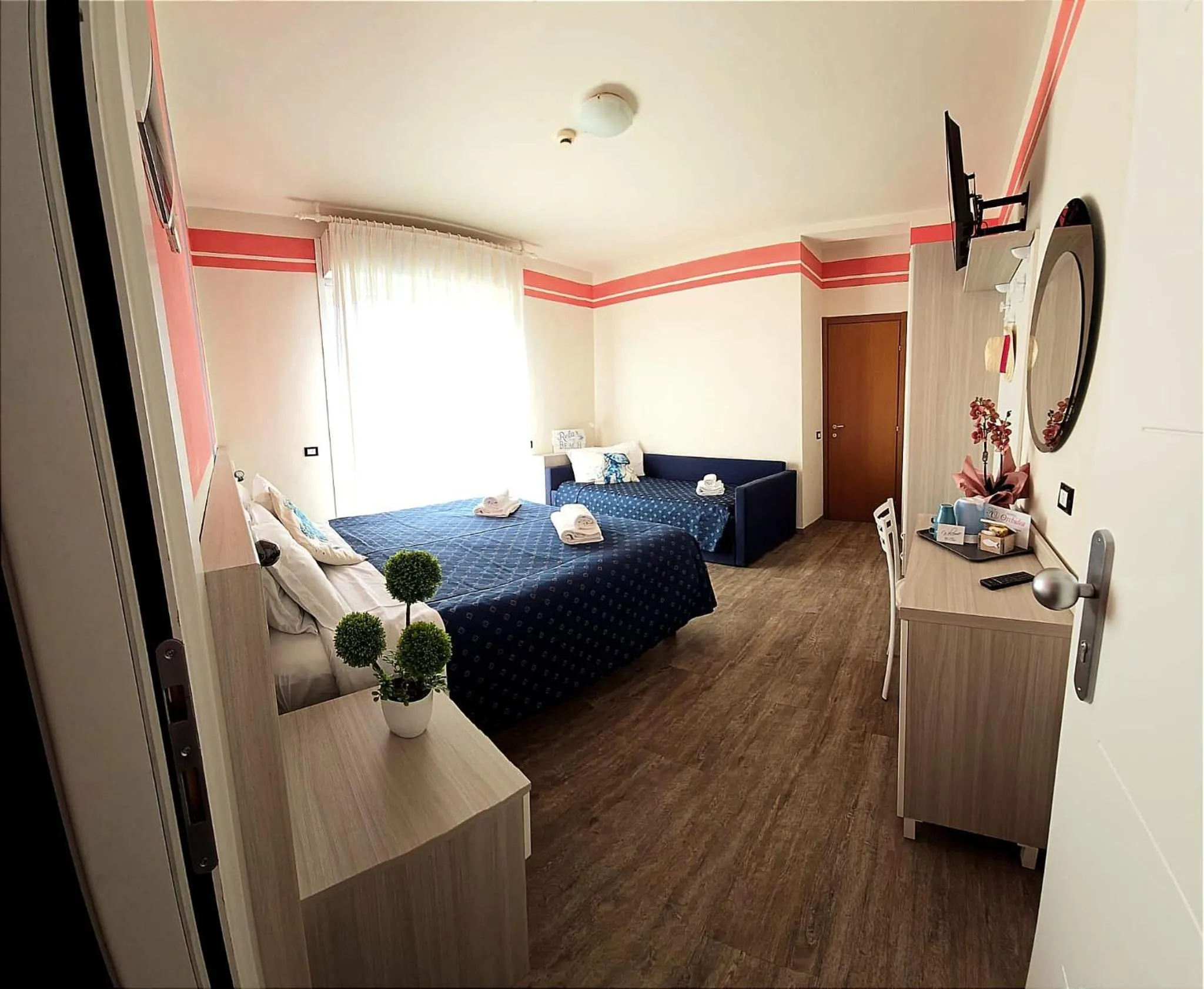 Bed in Hotel Orchidea