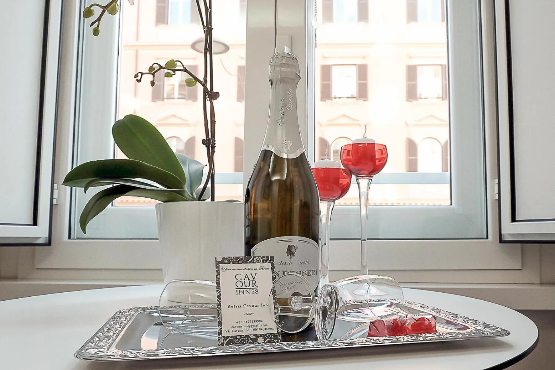 Bedroom in Relais Cavour Inn