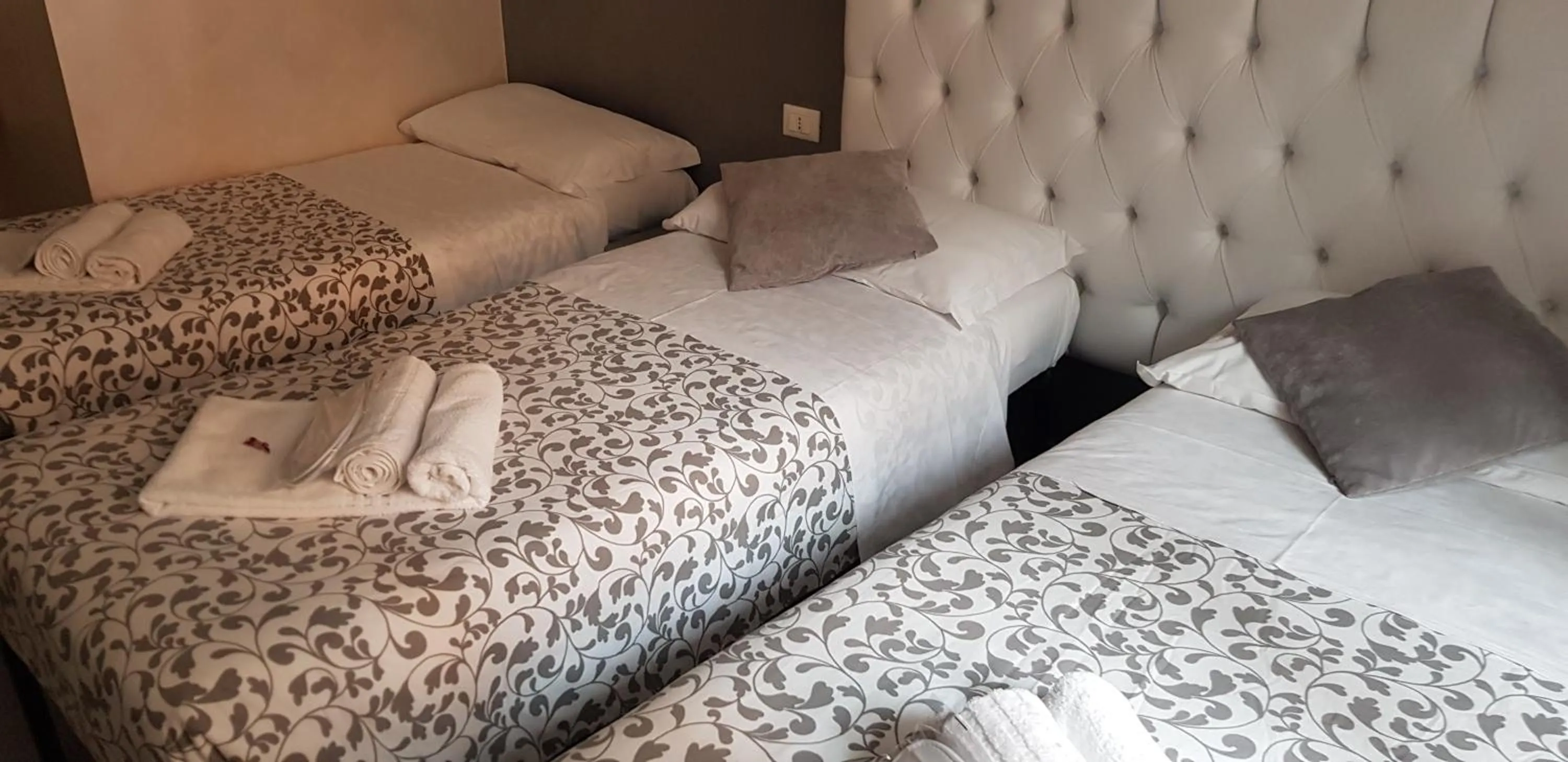 Bed in Relais Cavour Inn