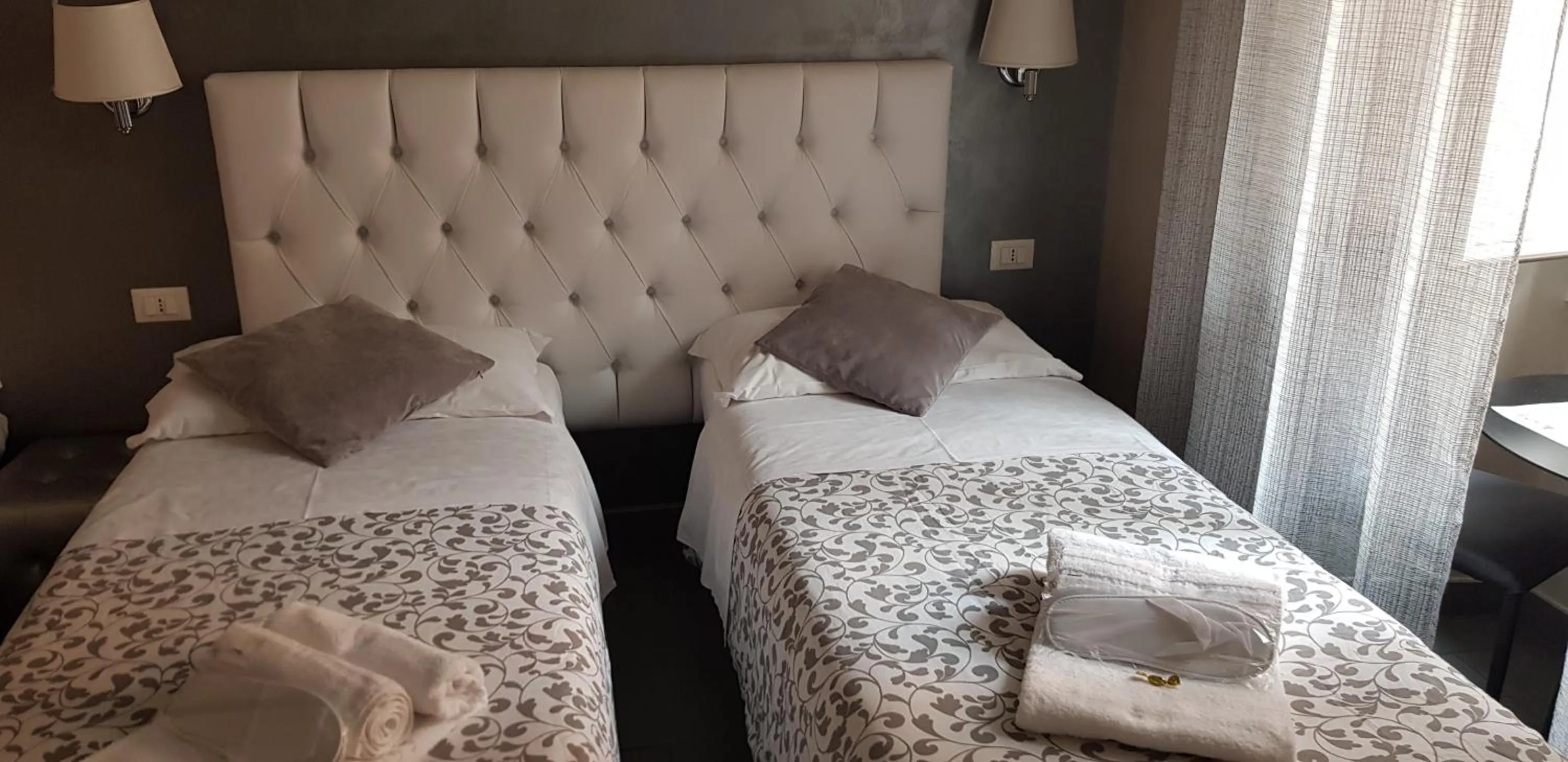 Bed in Relais Cavour Inn