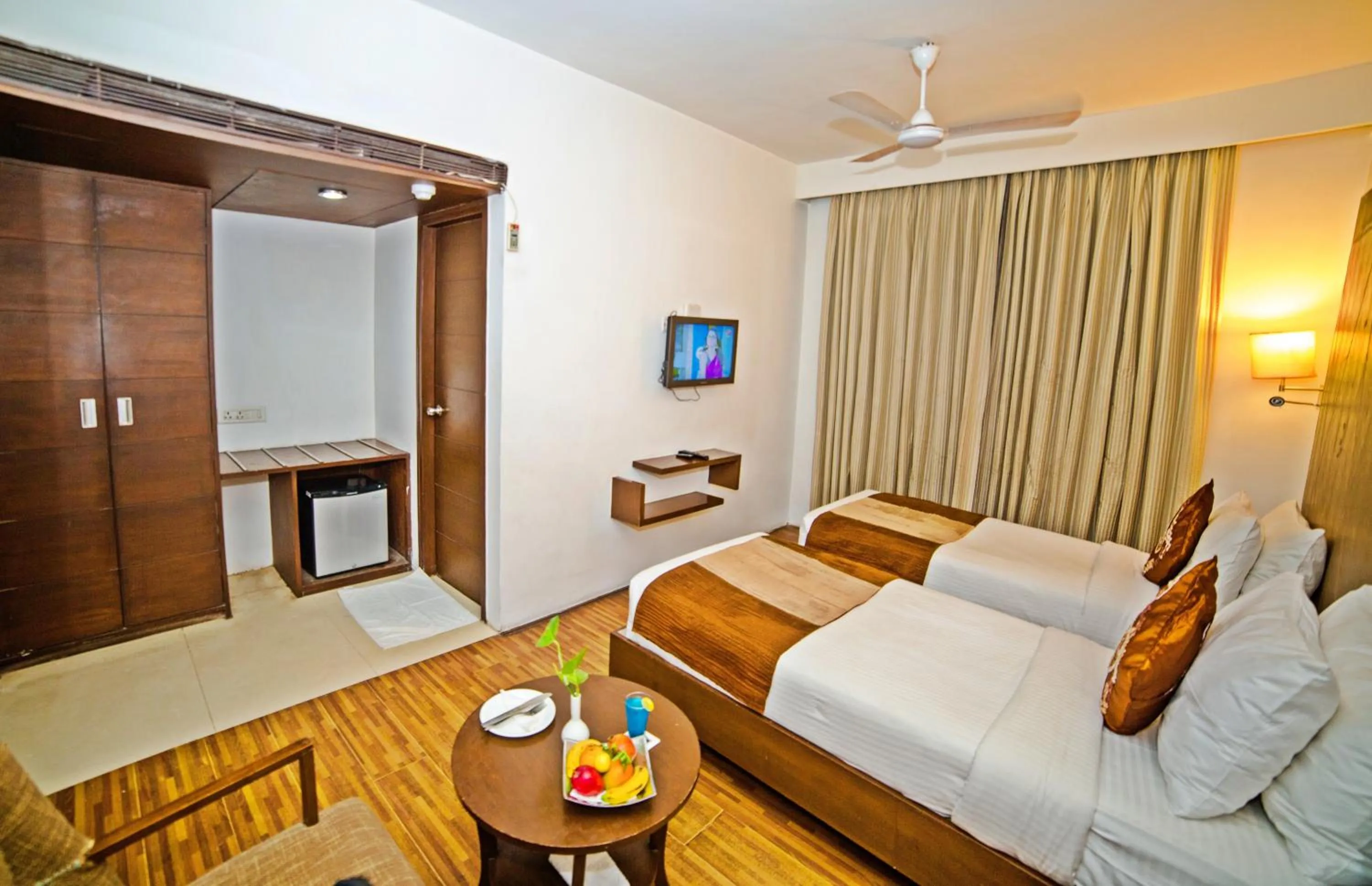 Photo of the whole room, Bed in Hotel Clarks Collection Bhavnagar