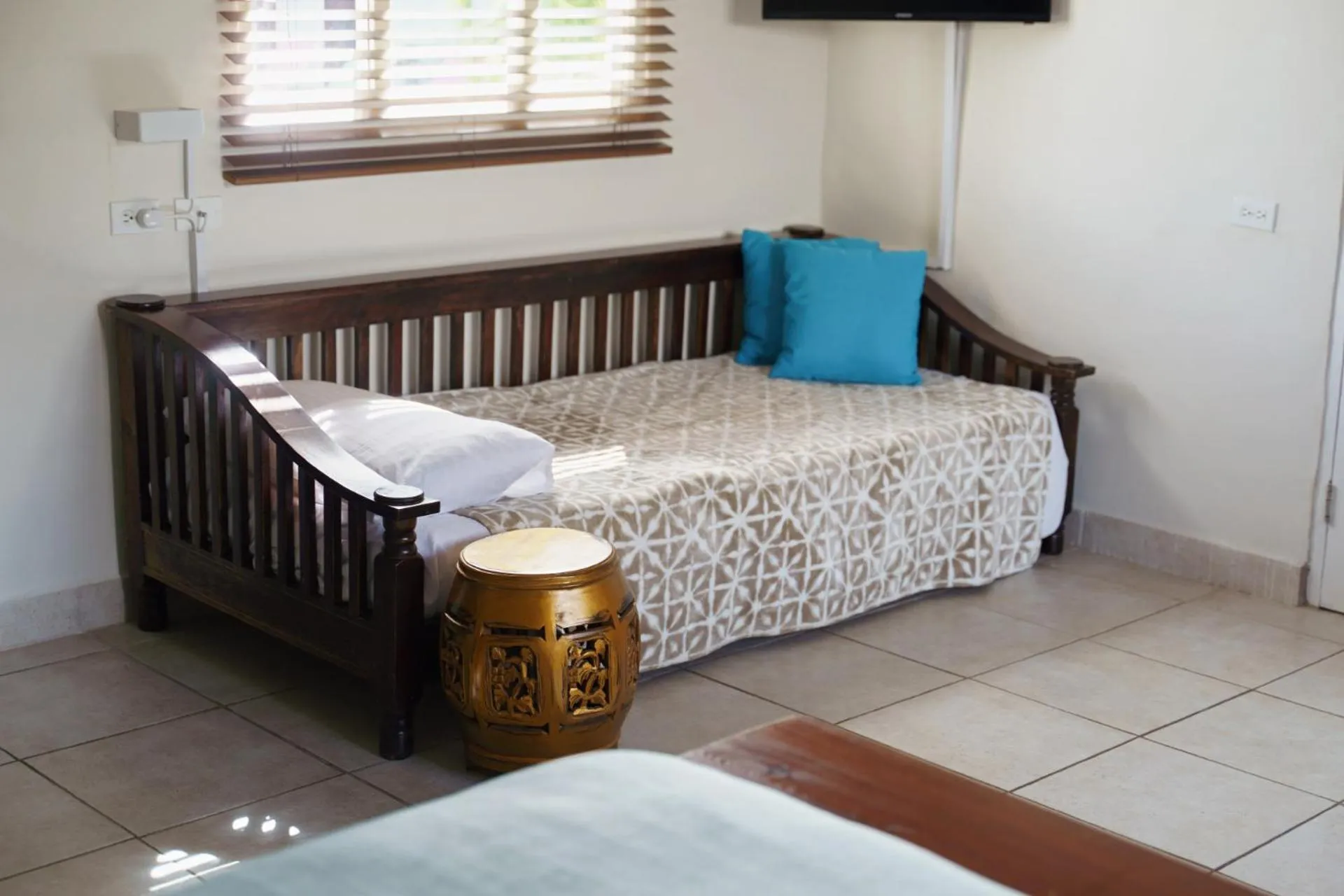 Bed in Arubiana Inn Hotel