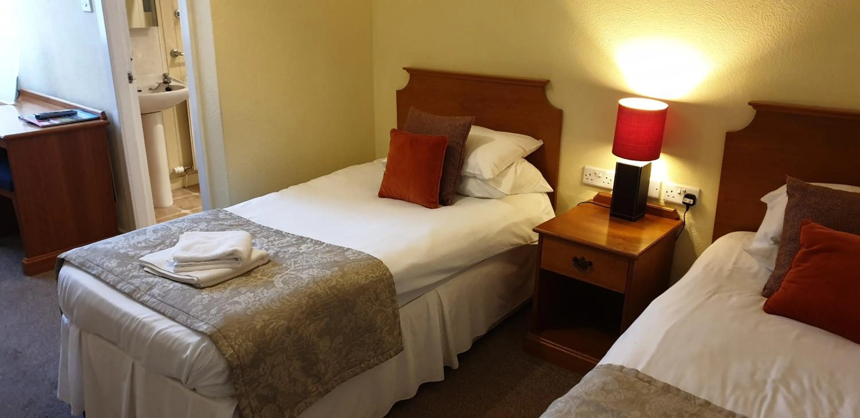 Bed in The Spread Eagle Hotel