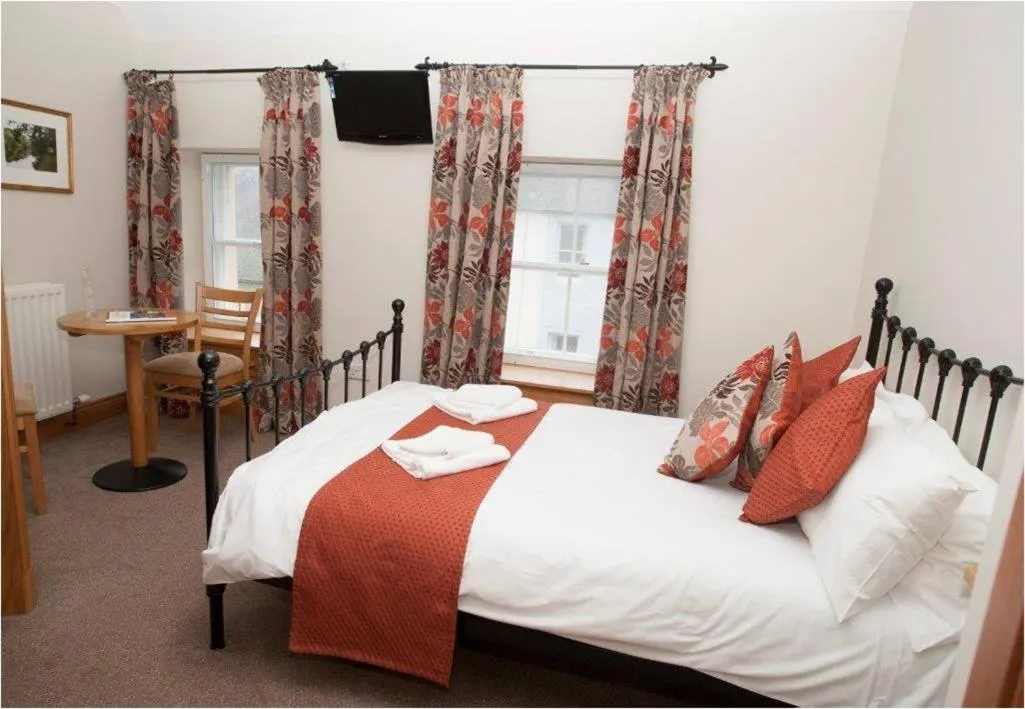 Bed in The Spread Eagle Hotel