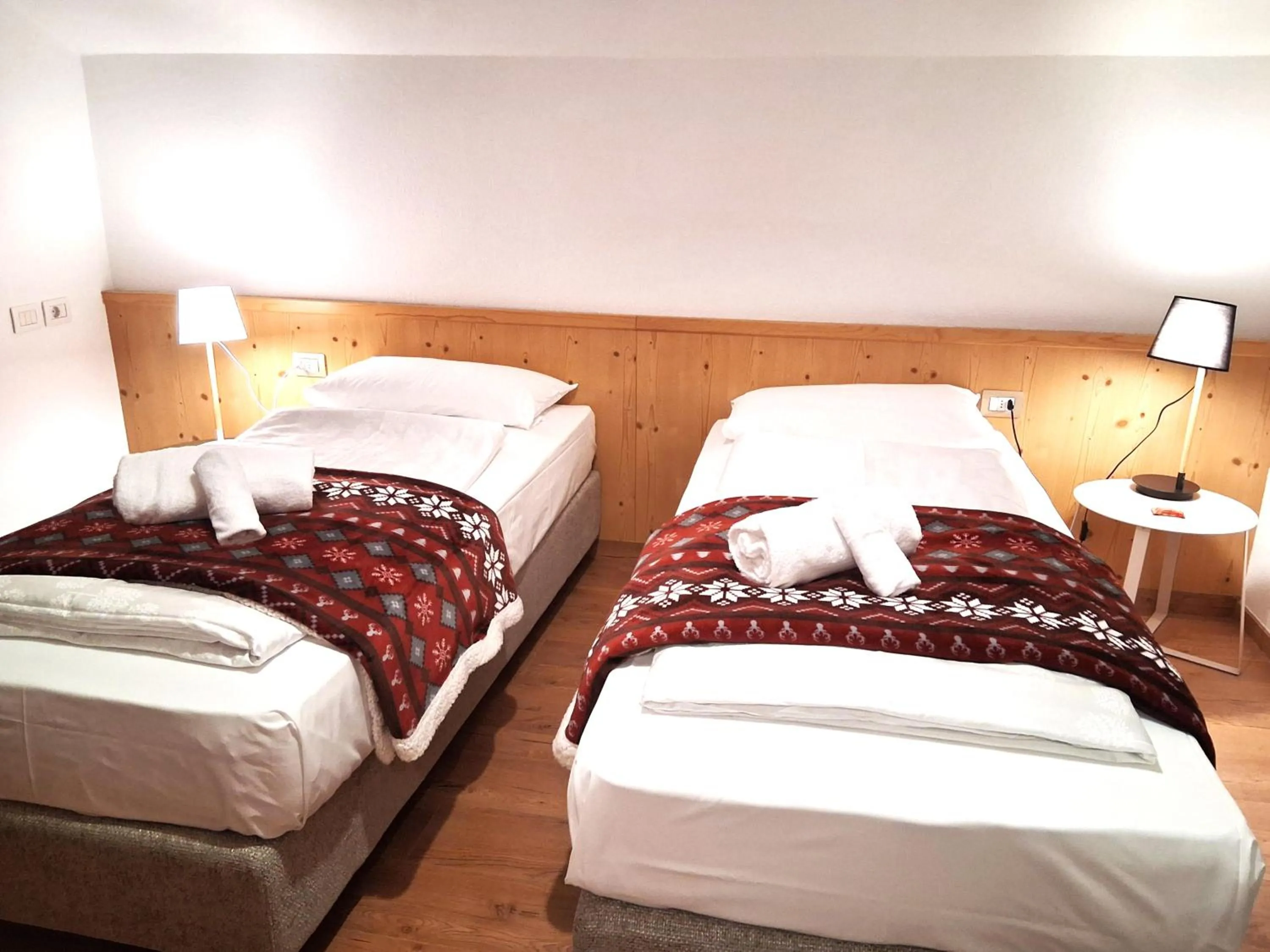 Bed in Hotel Kronplatzer Hof