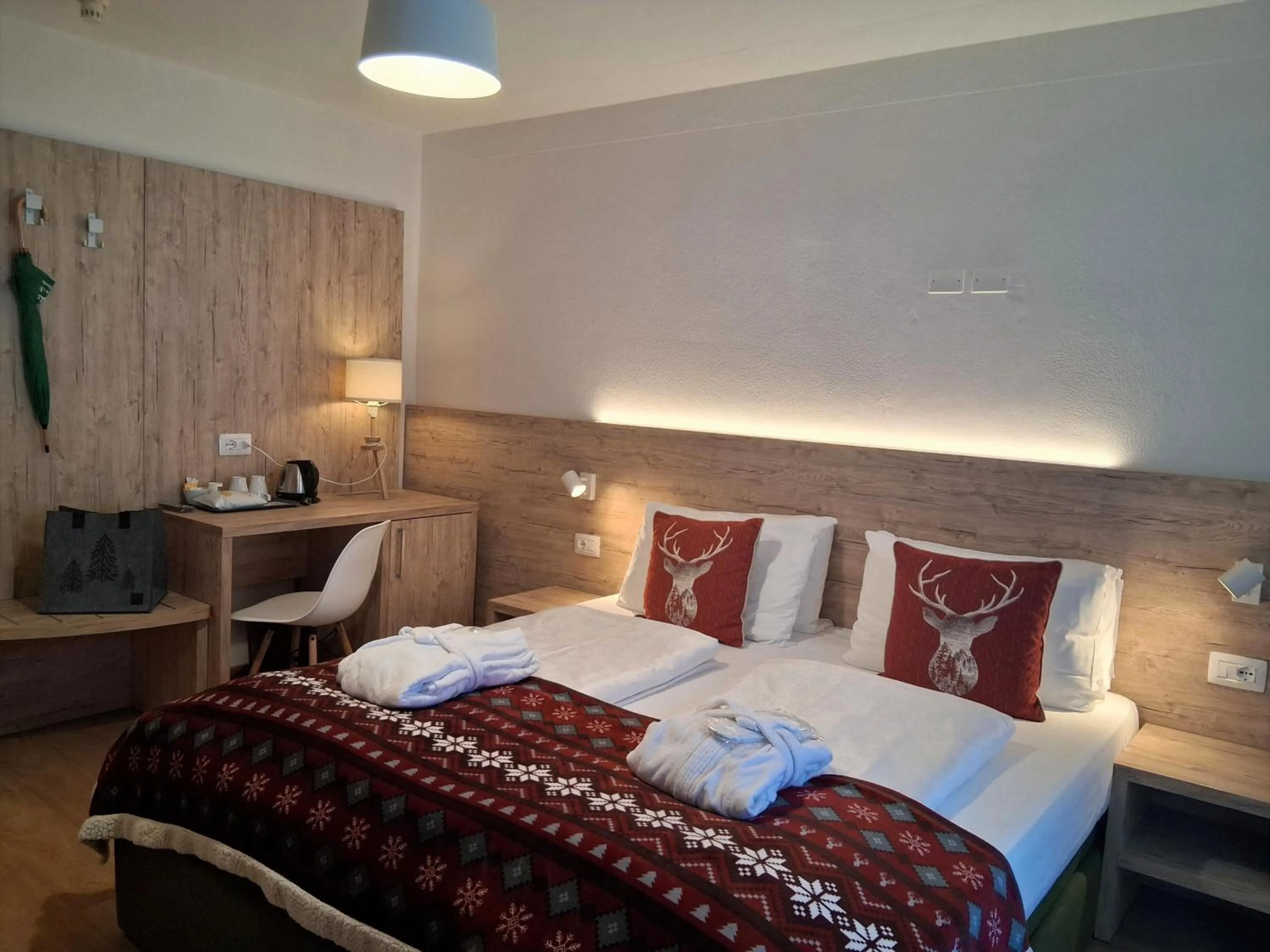 Bed in Hotel Kronplatzer Hof