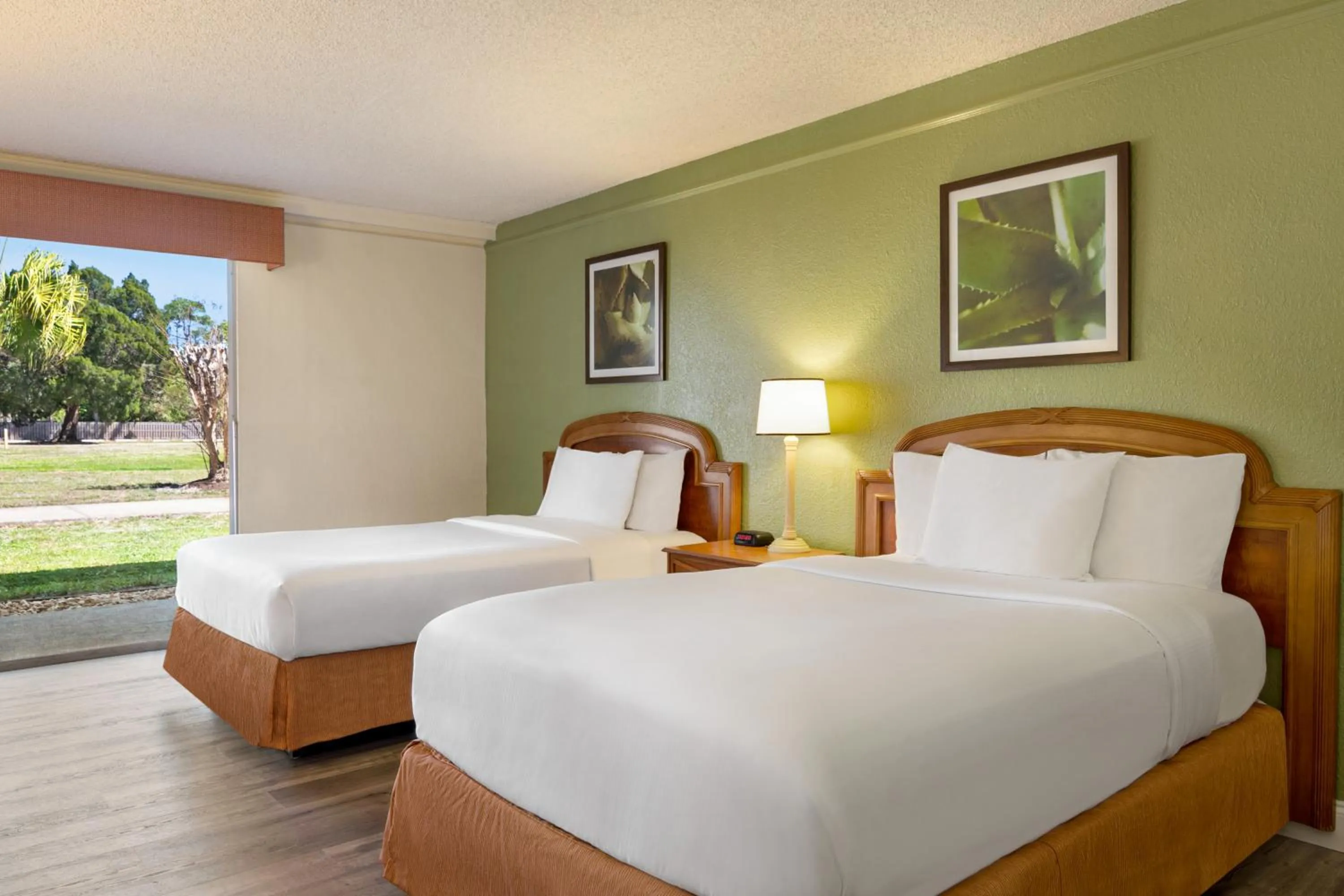 Bedroom, Bed in Baymont by Wyndham Intl Speedway I-95 Daytona Beach