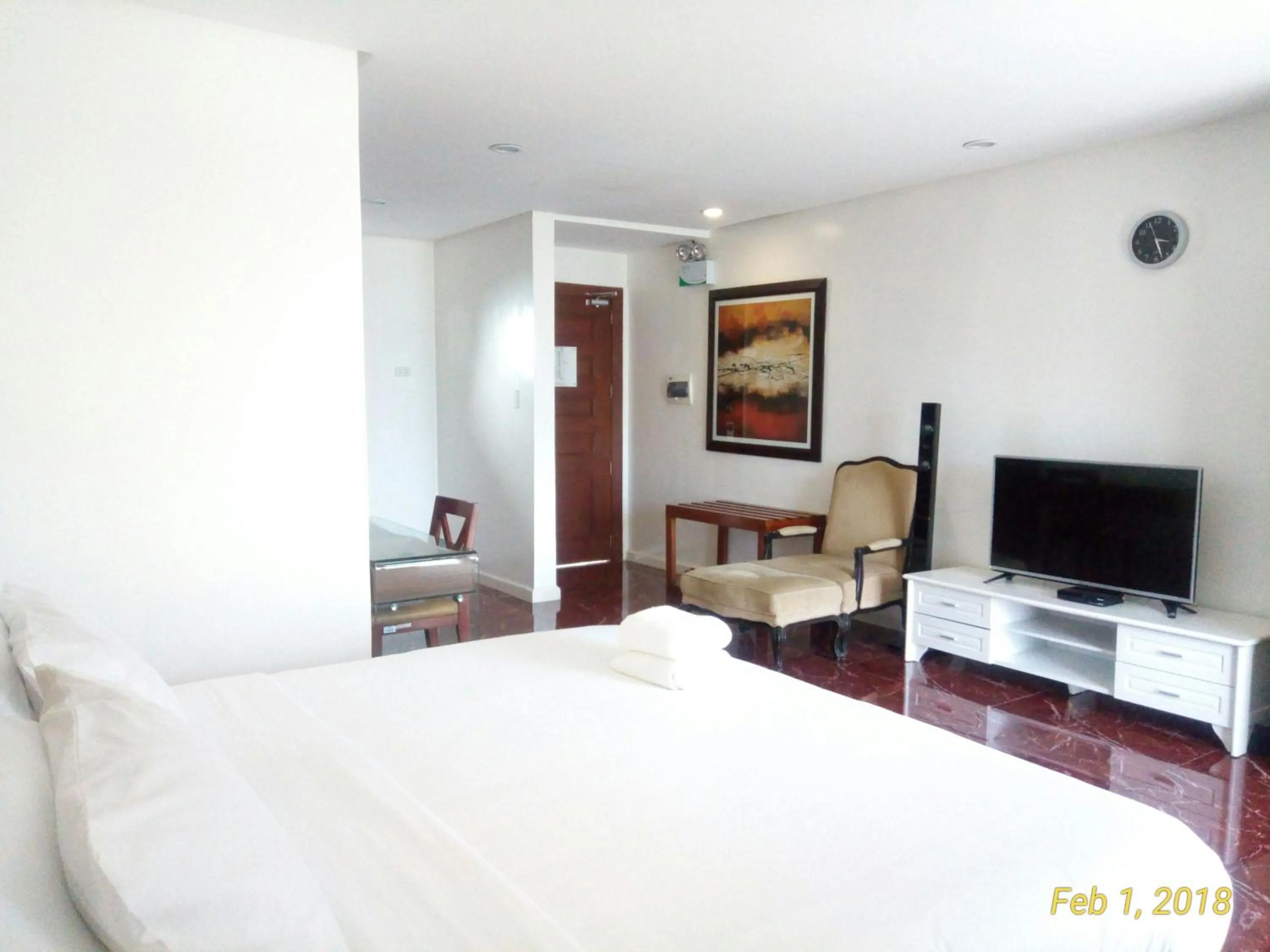 Photo of the whole room, Bed in Centtro Residences