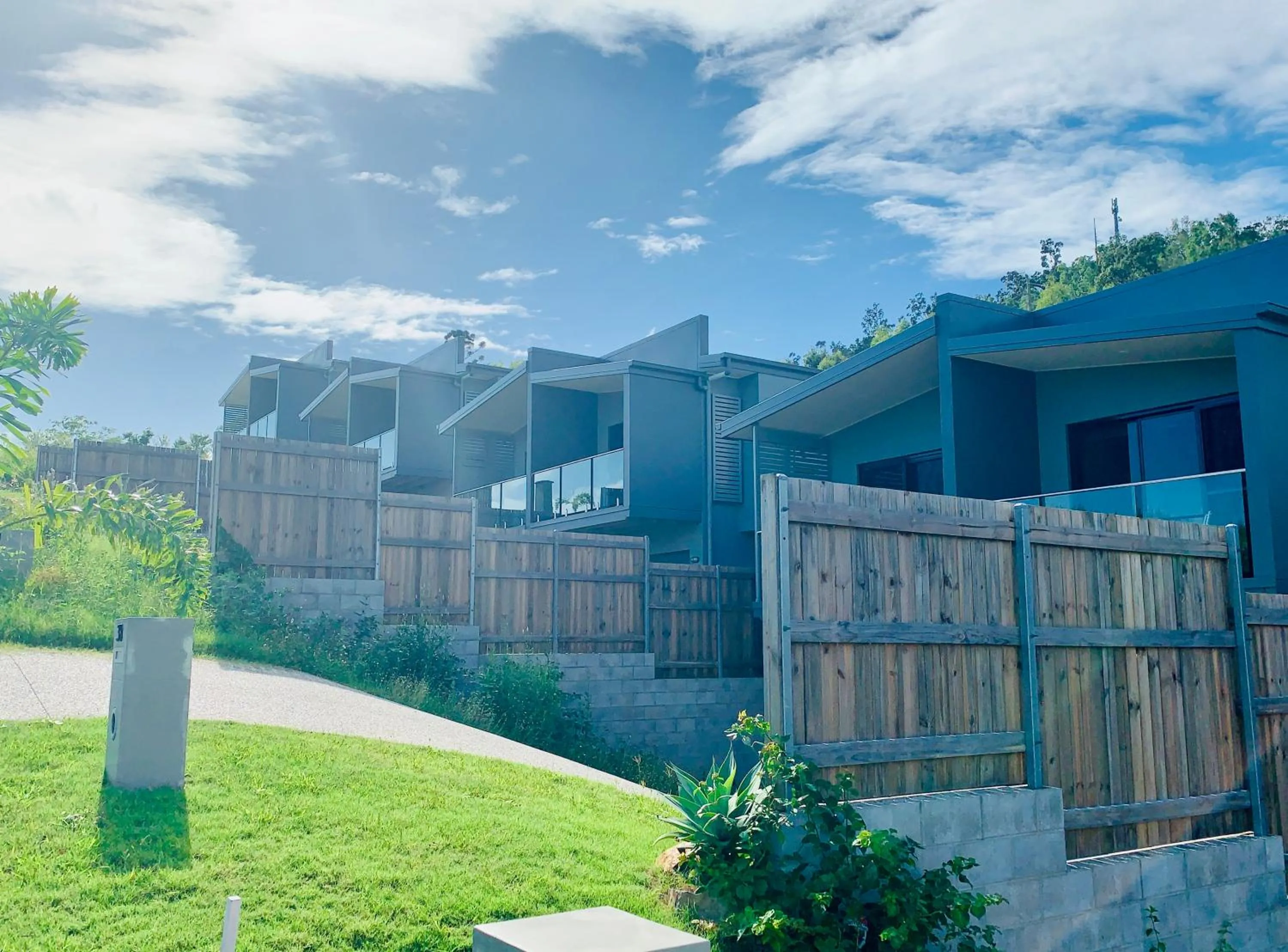 Property building in DAYDREAMING Airlie Beach, Water views & only 200m to boardwalk.