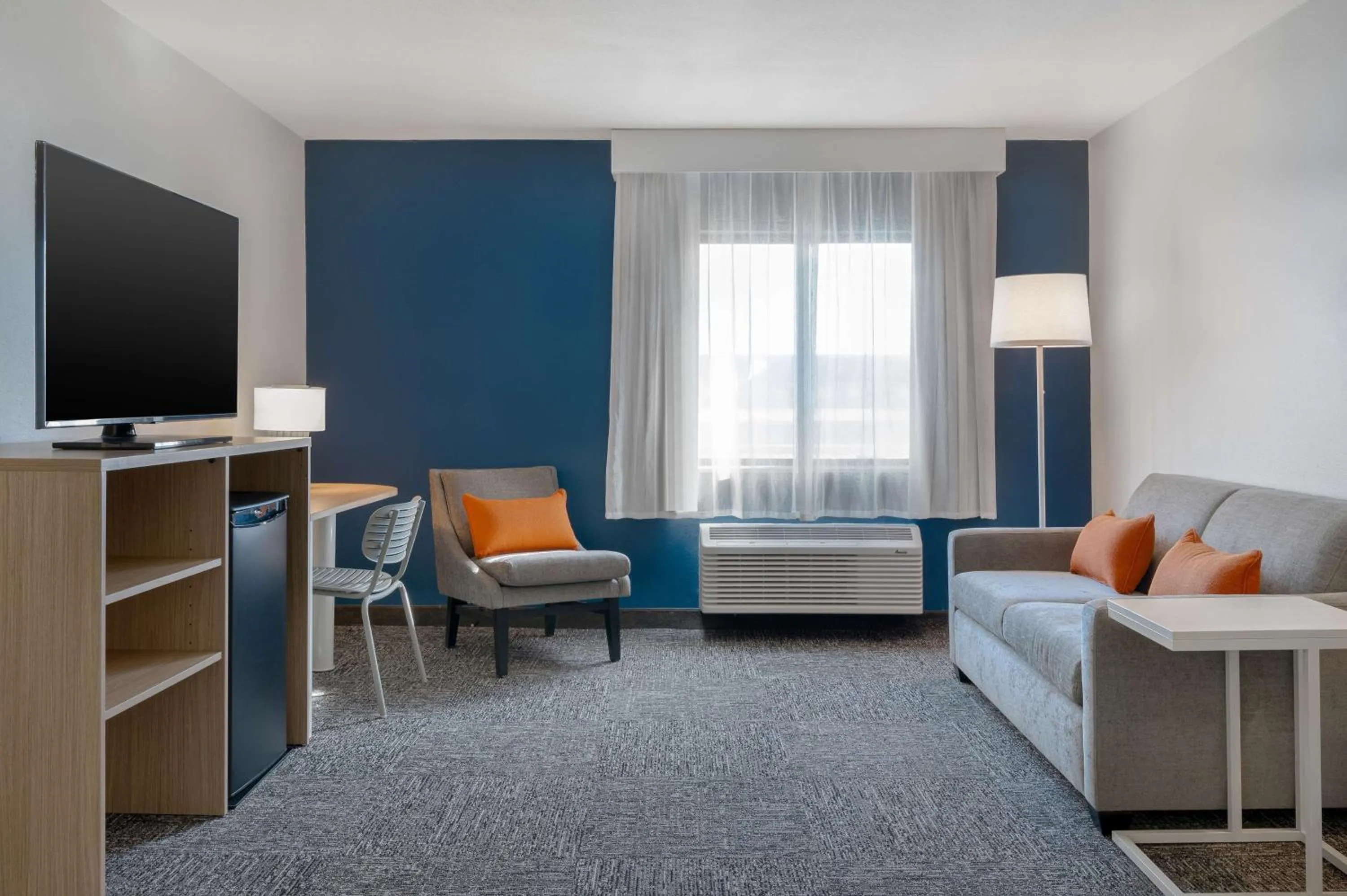 Living room, Bed in Spark by Hilton Savannah Midtown