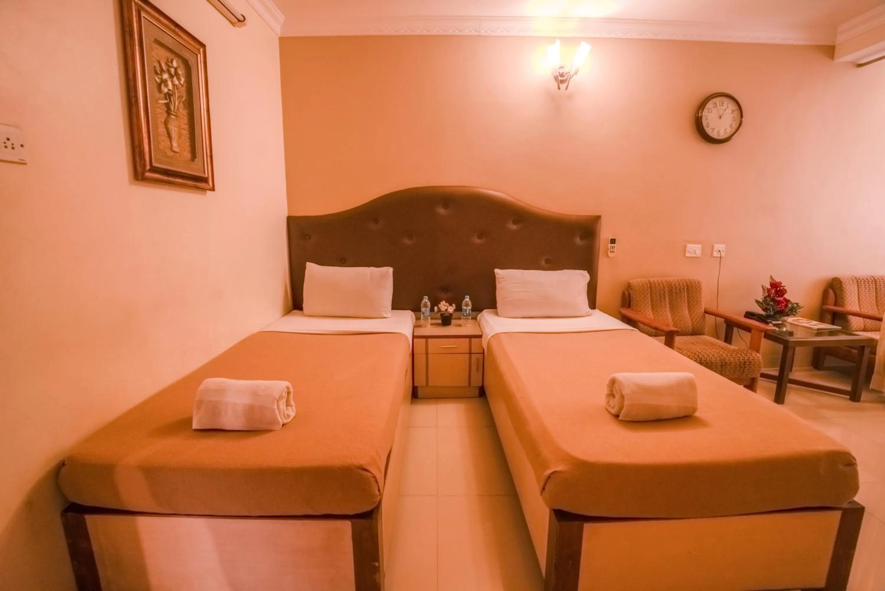 Bed in HOTEL UDUPI INTERNATIONAL