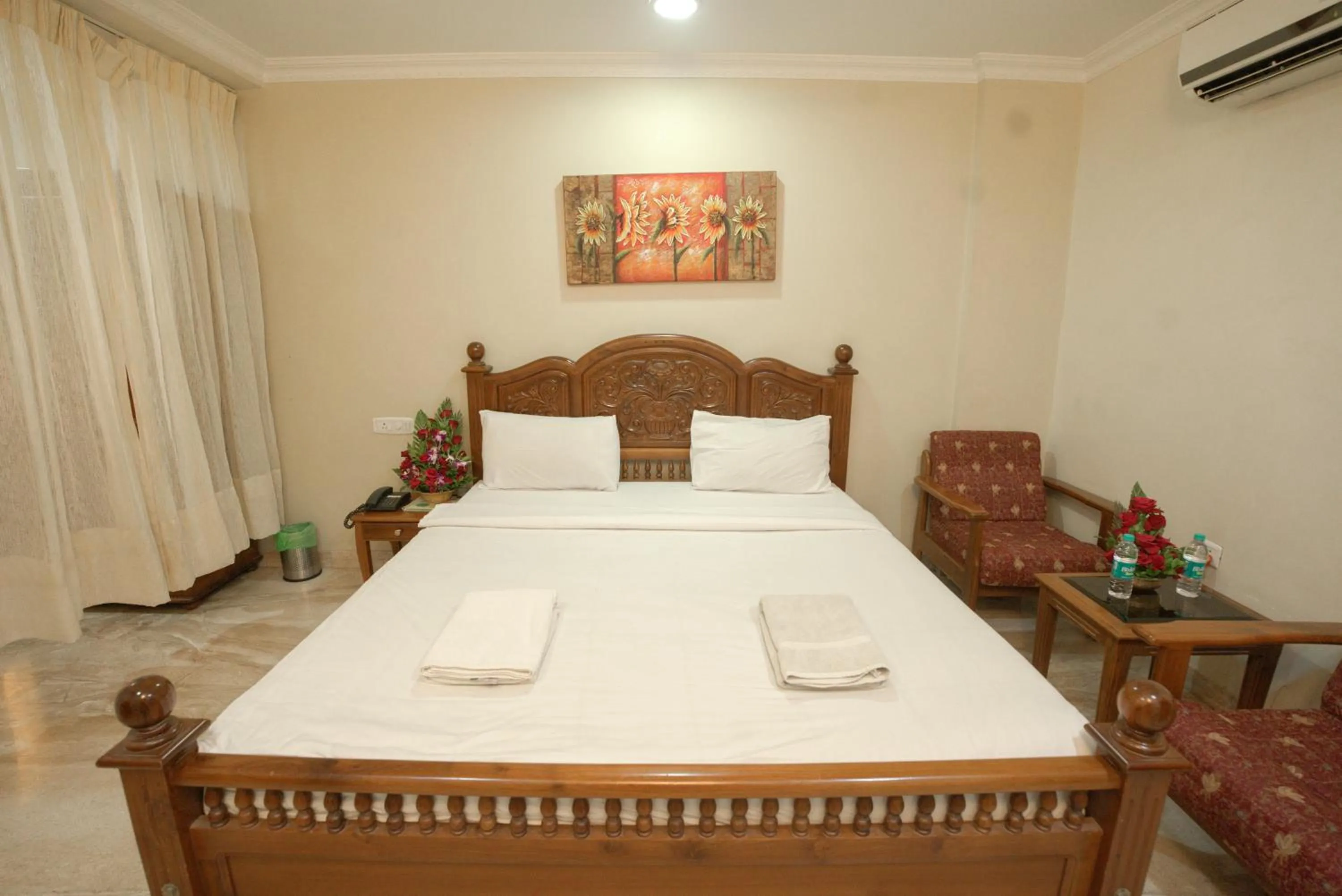 Bed in HOTEL UDUPI INTERNATIONAL