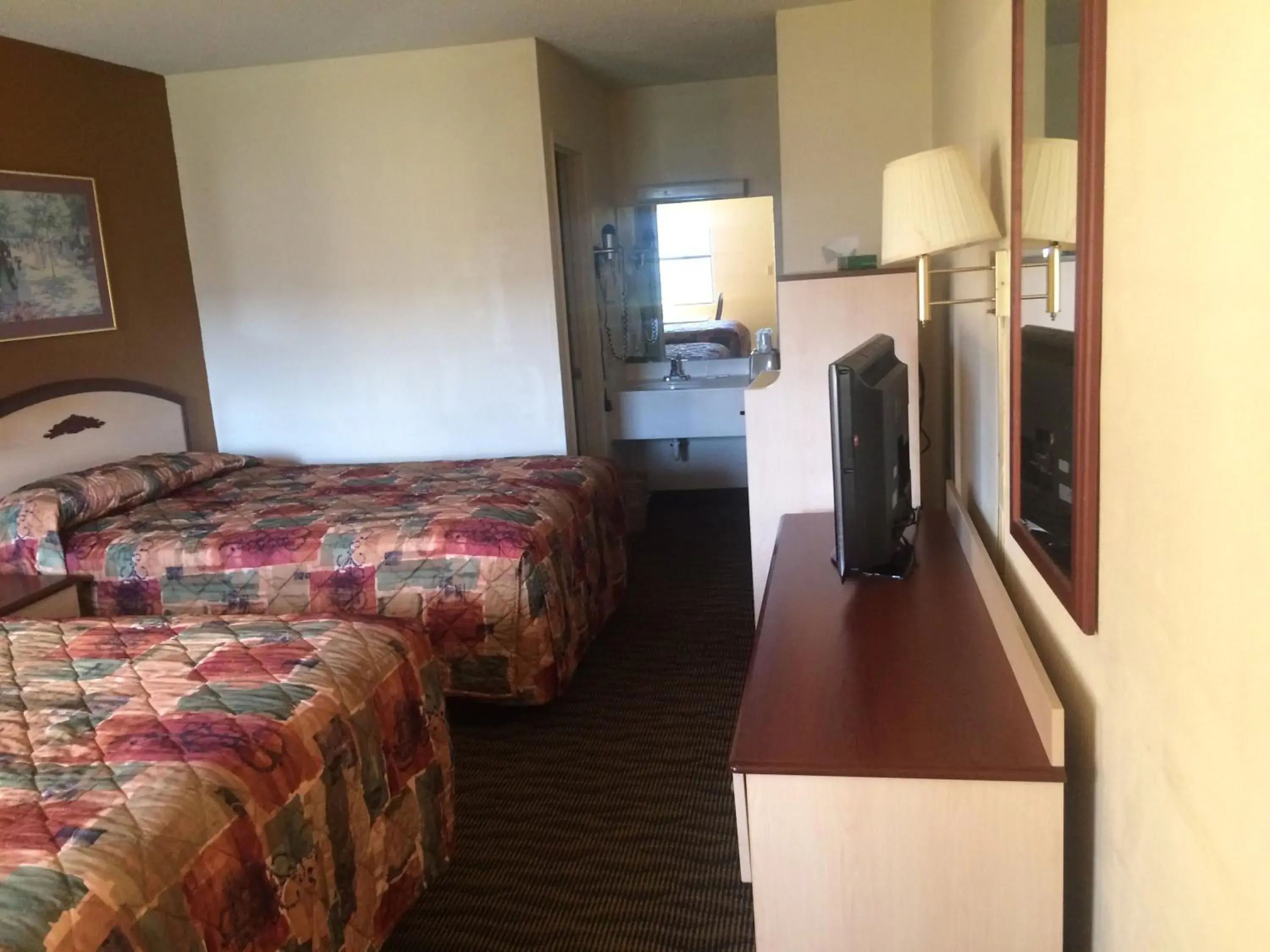 Bed in Budget Inn & Suites - Talladega