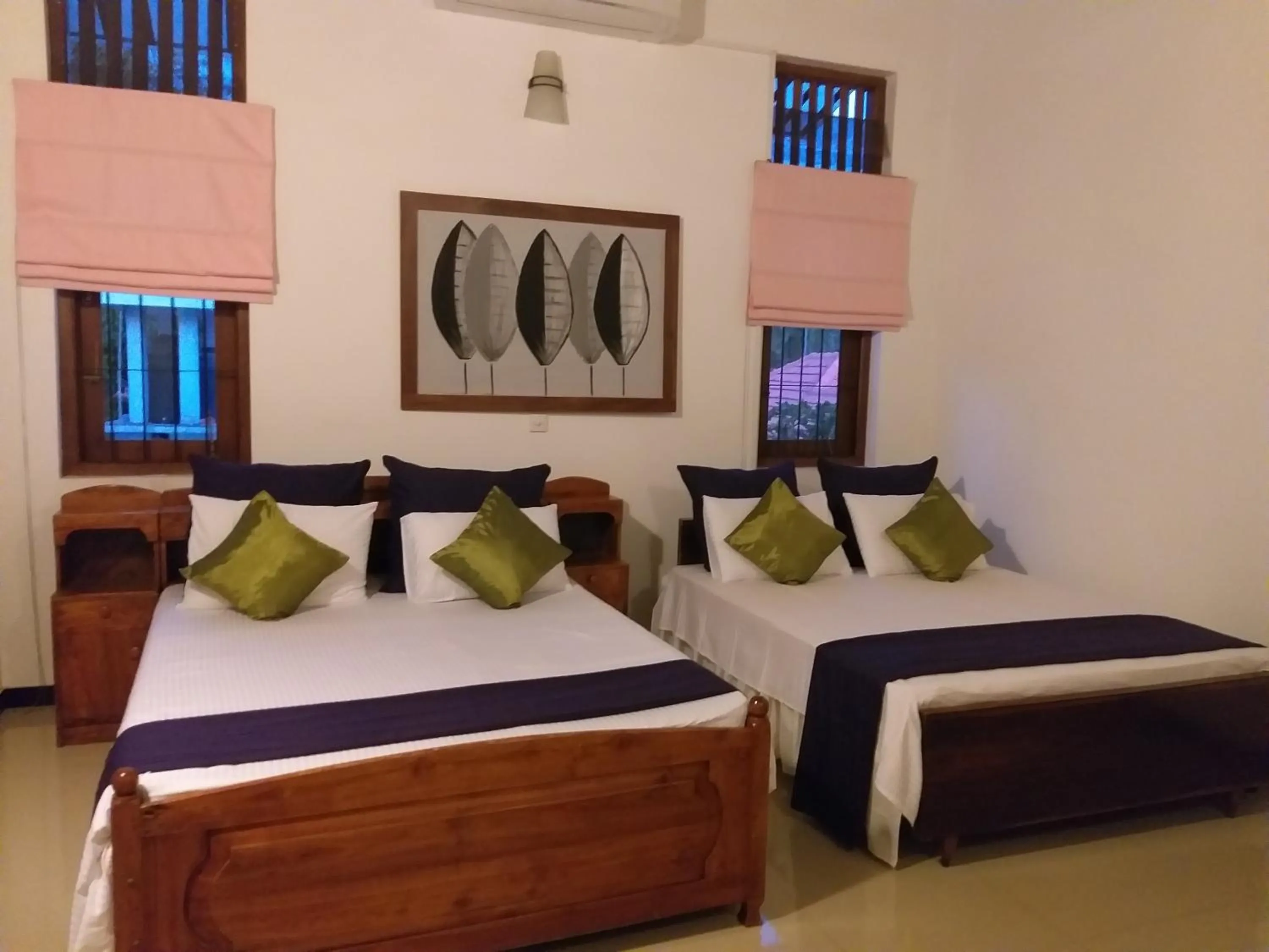 Quadruple Room with Bathroom in Cosy Nest Home stay