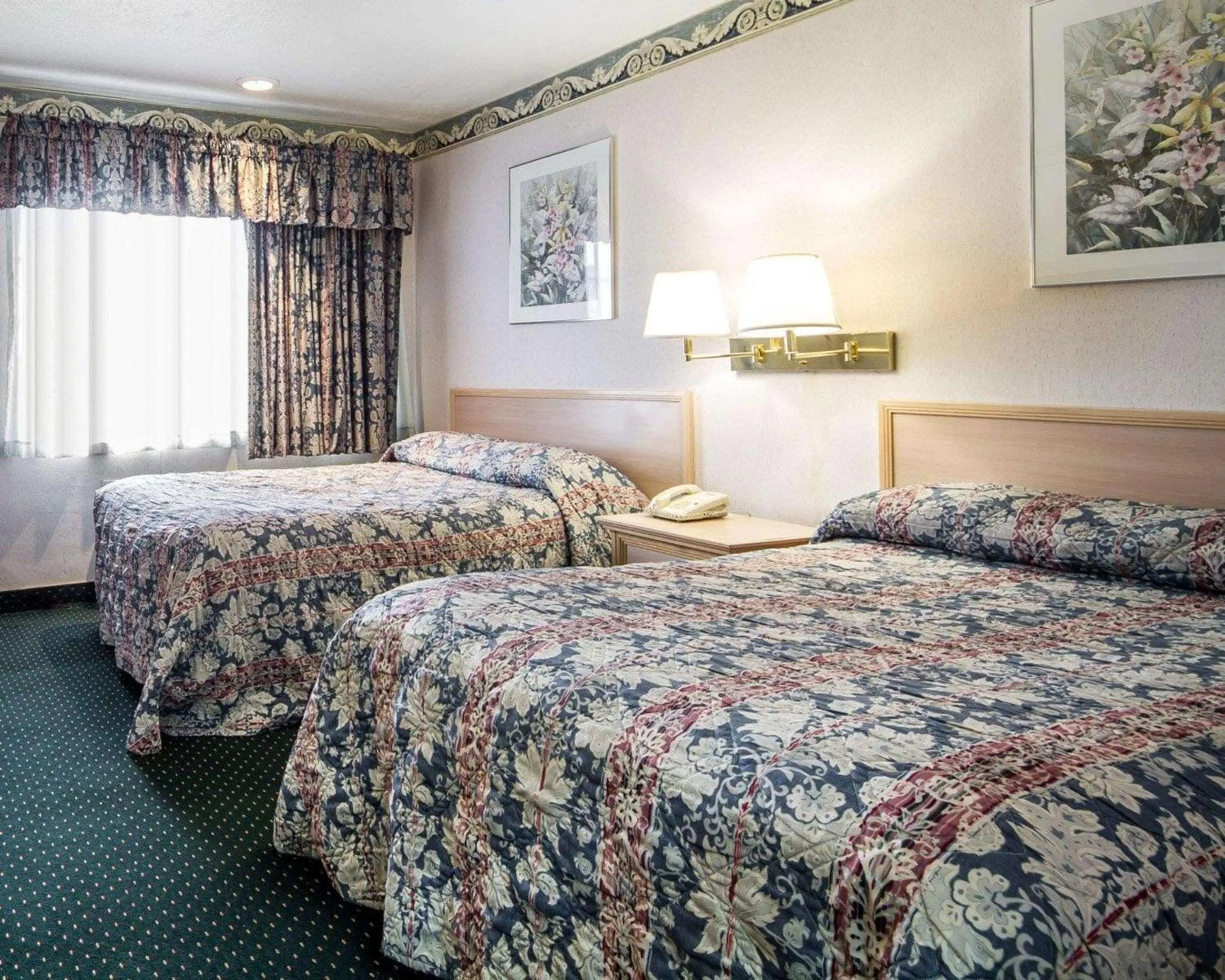 Photo of the whole room, Bed in Rodeway Inn Monterey Near Fairgrounds