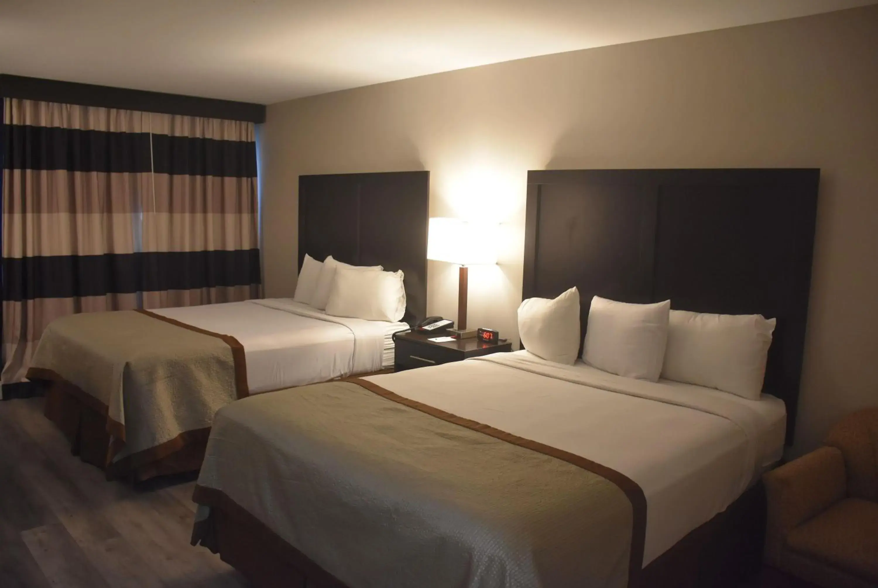 Photo of the whole room, Bed in Ramada by Wyndham Vineland Millville Area Photo of the whole room, Bed in Ramada by Wyndham Vineland Millville Area