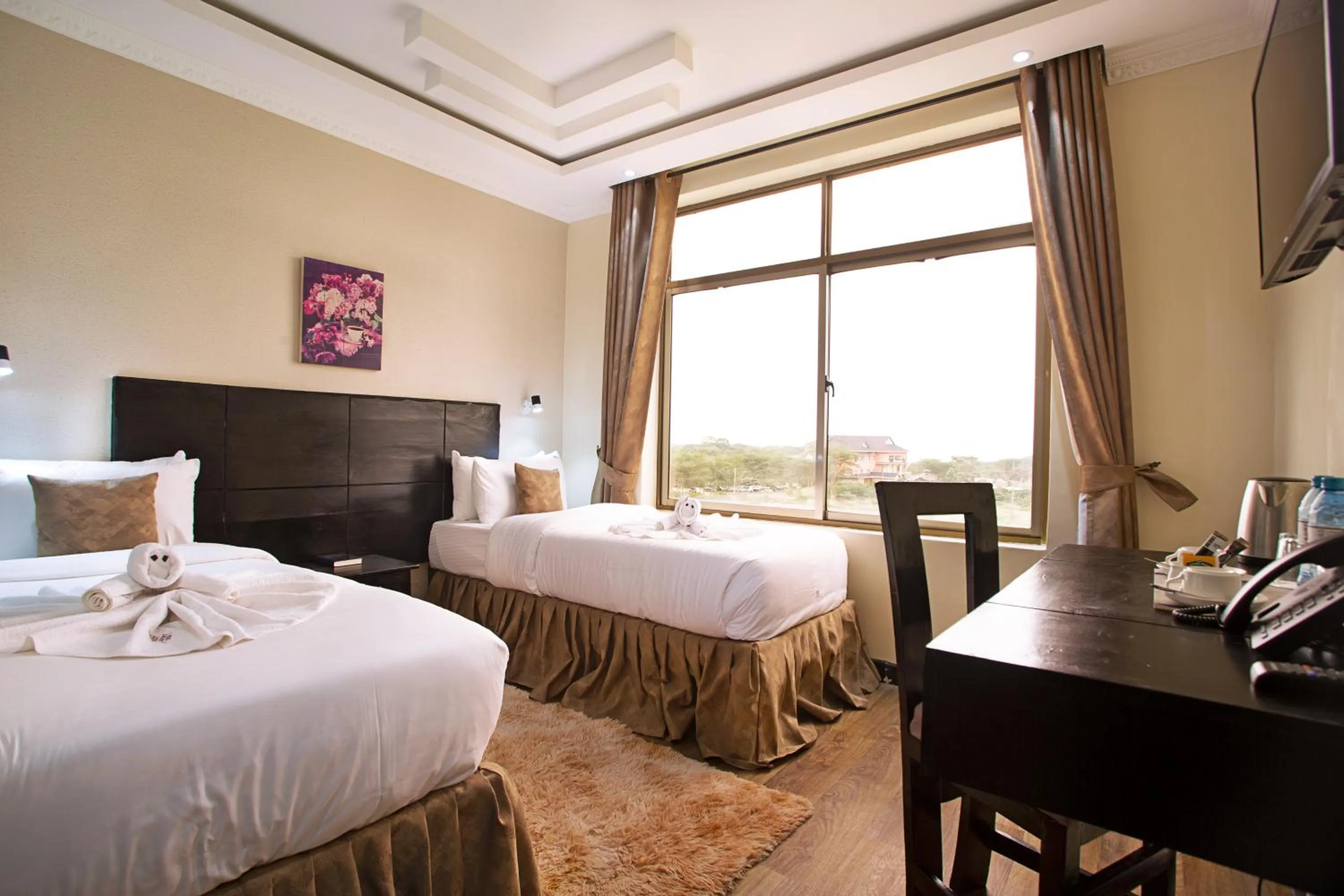 Bed in The Nest Boutique Hotel