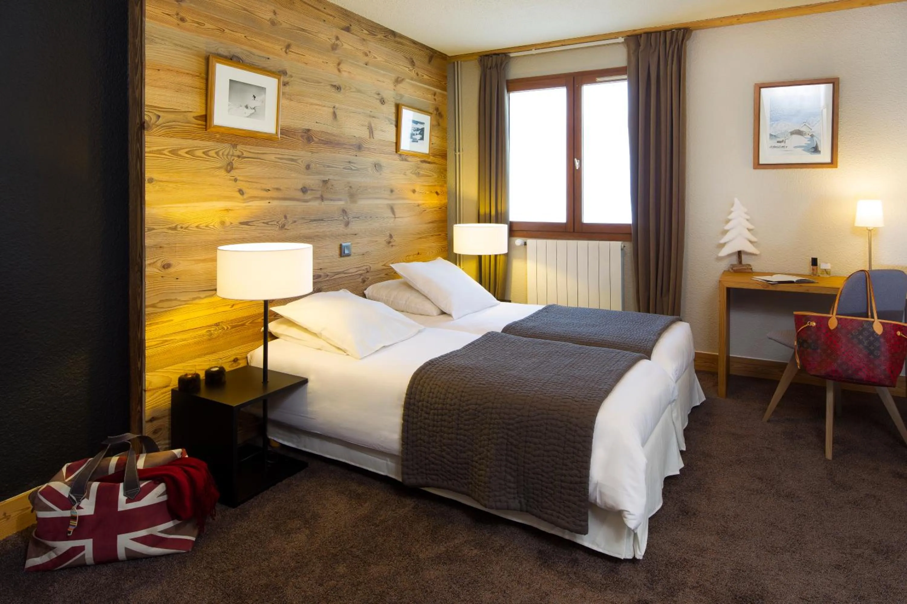 Bed in Hillary Hotel