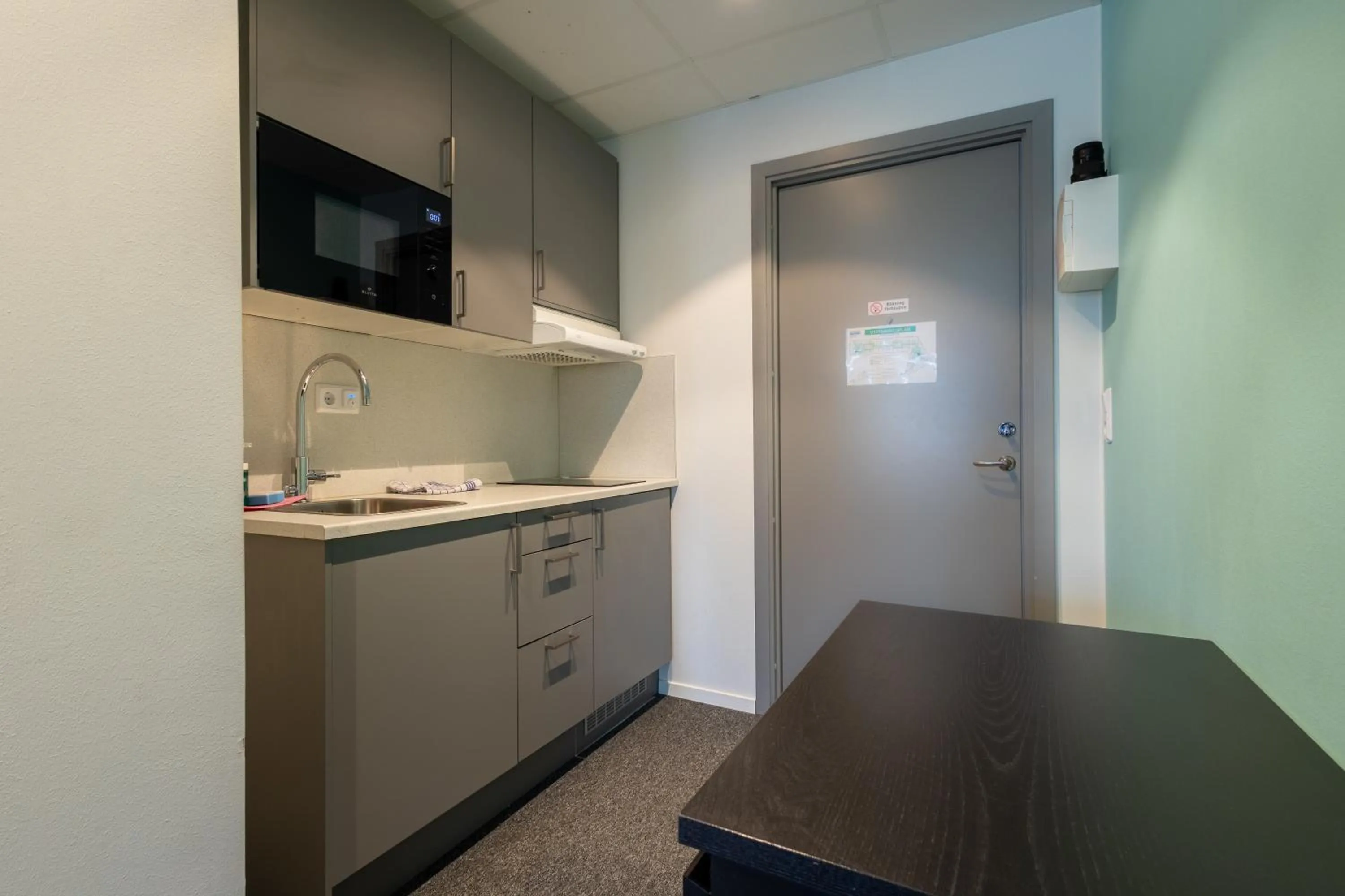 kitchen in Stockholm Hotel Apartments Sollentuna