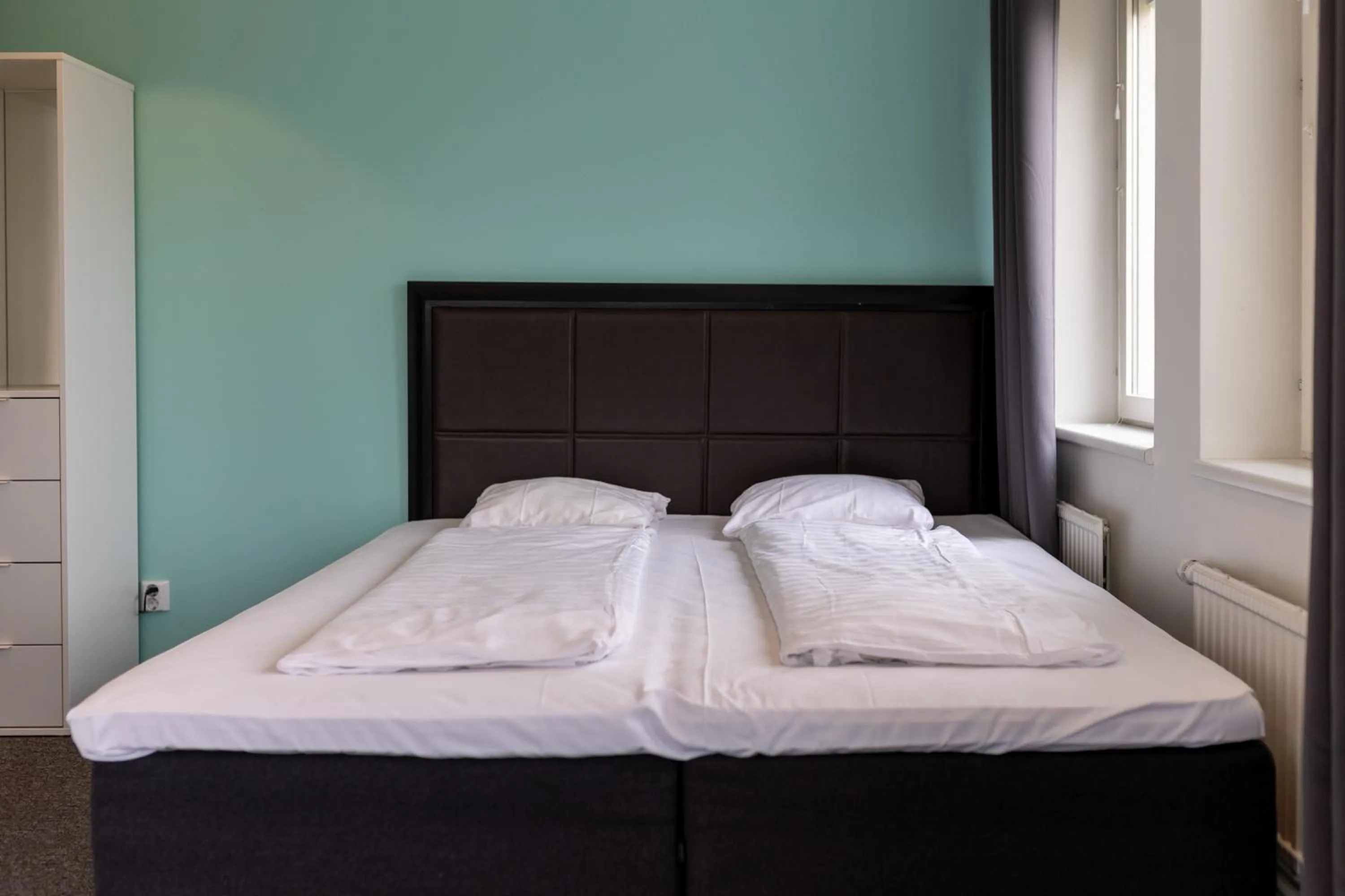 Bed in Stockholm Hotel Apartments Sollentuna