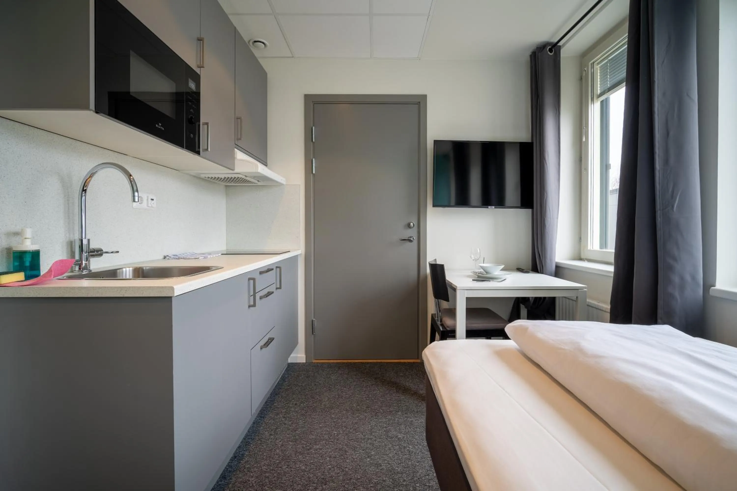 Bedroom in Stockholm Hotel Apartments Sollentuna