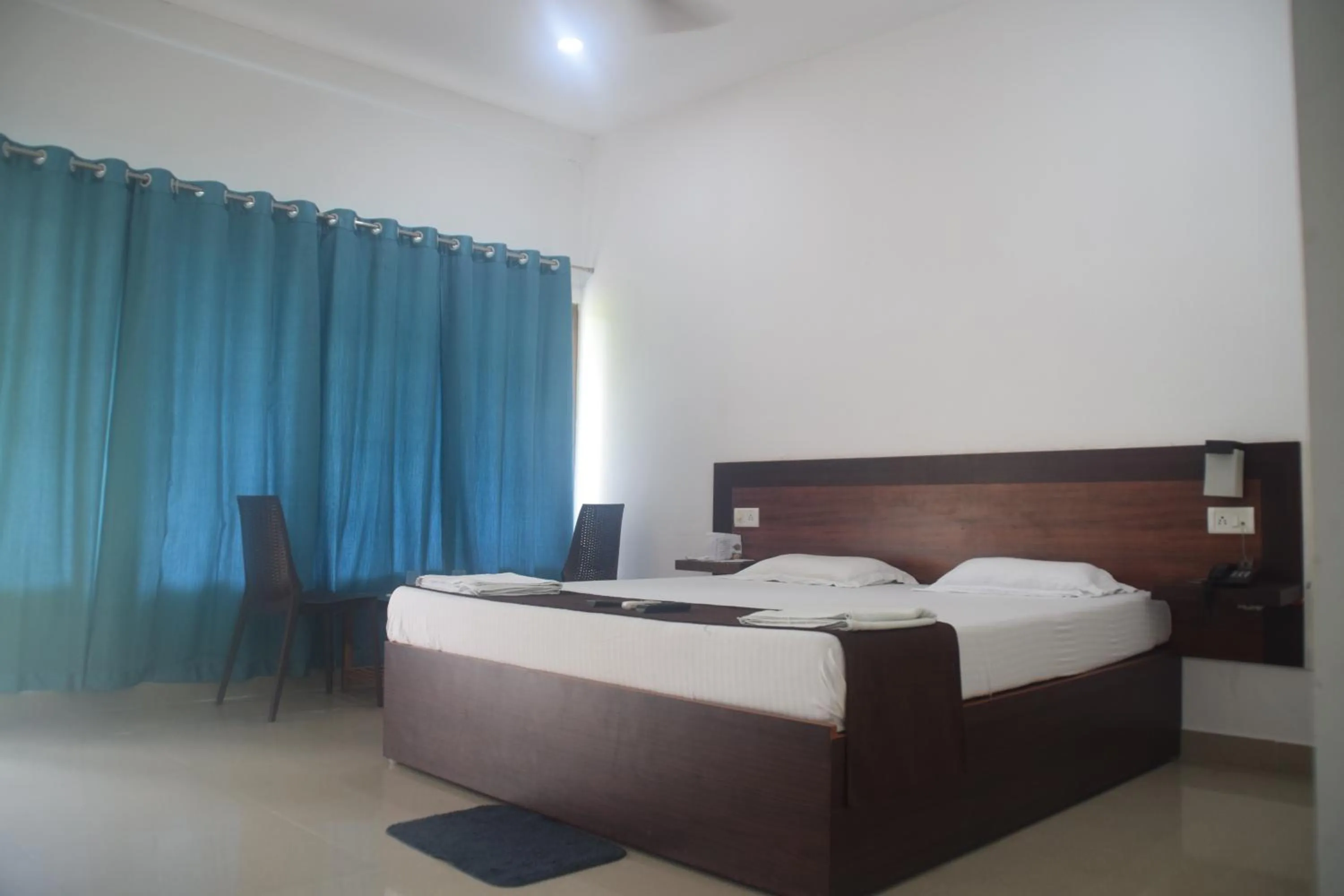 Bed in Hotel Exotica Squares