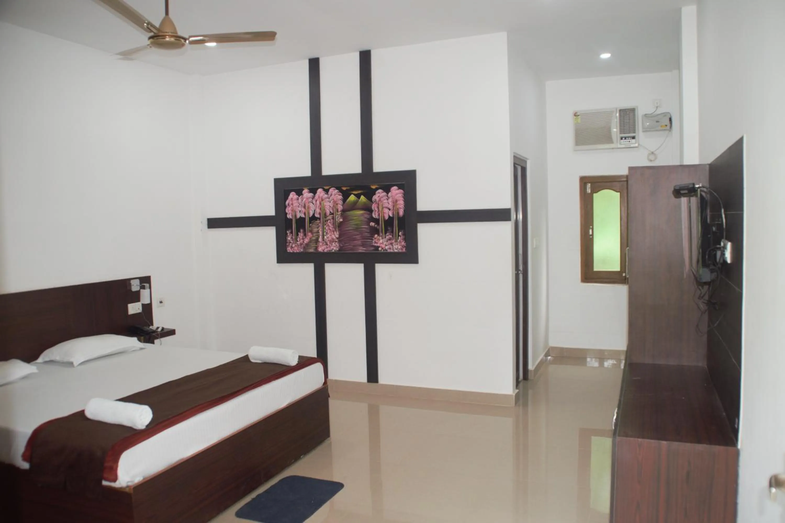 Bed in Hotel Exotica Squares