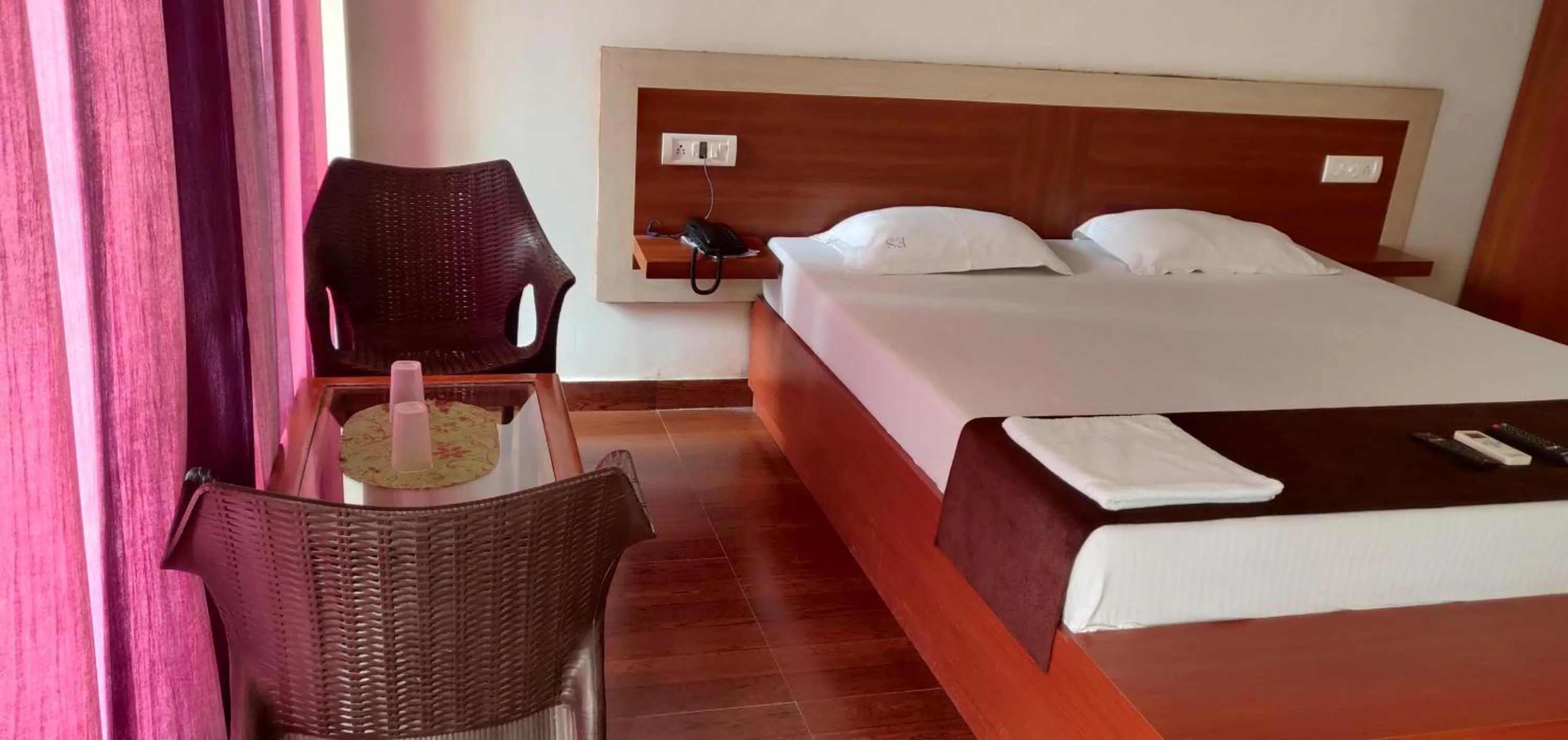 Bed in Hotel Exotica Squares