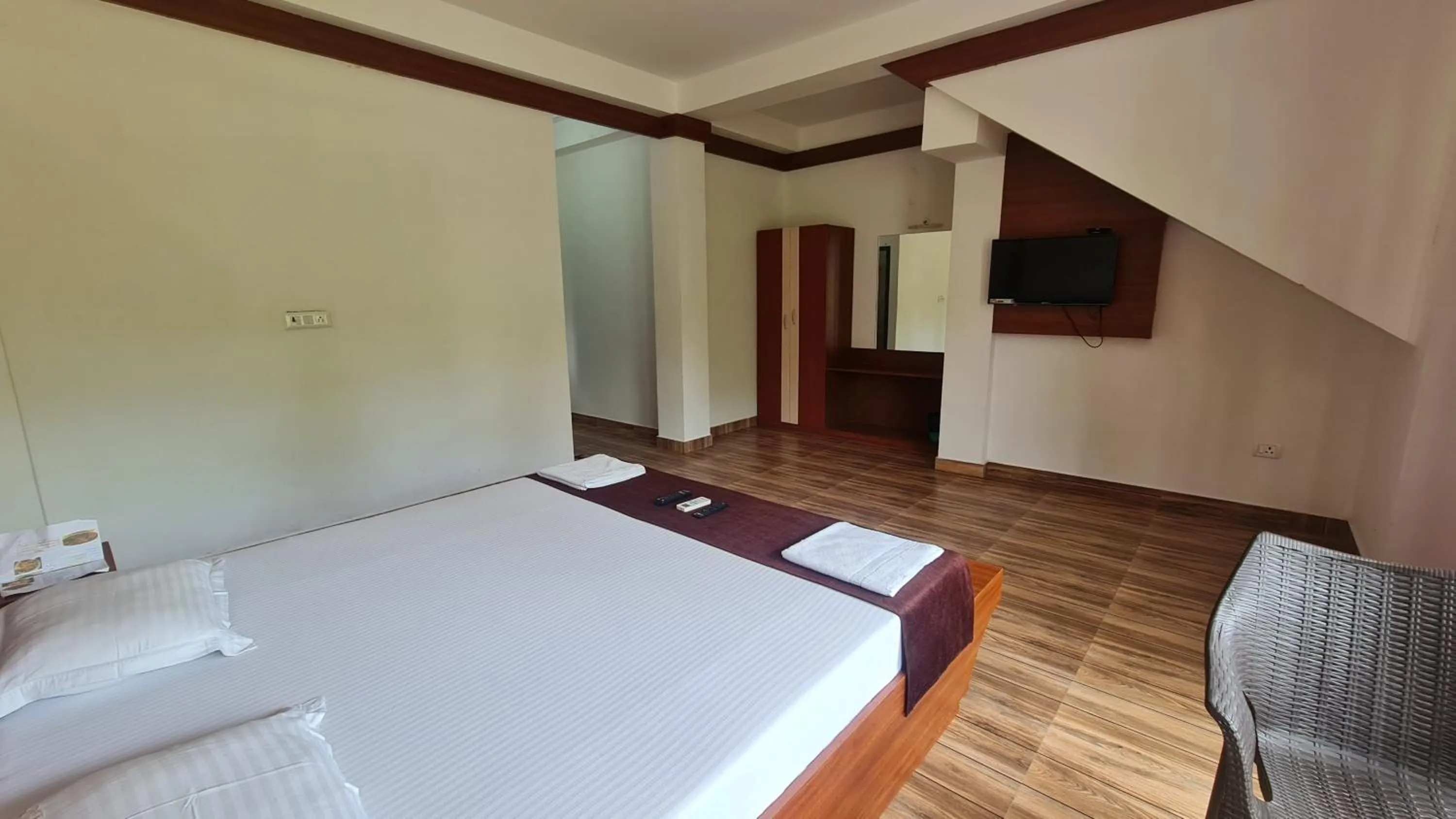 Bed in Hotel Exotica Squares