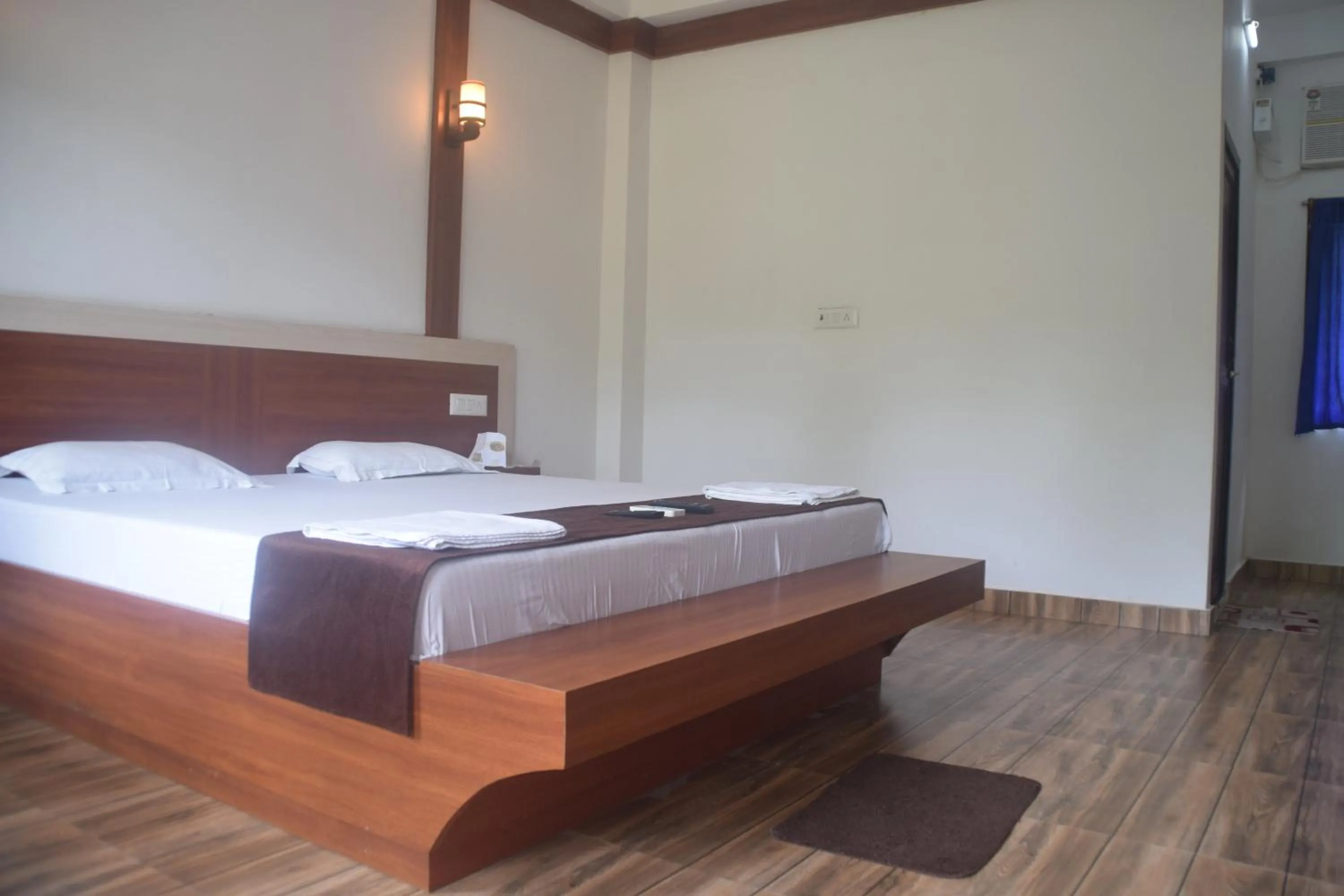 Bed in Hotel Exotica Squares