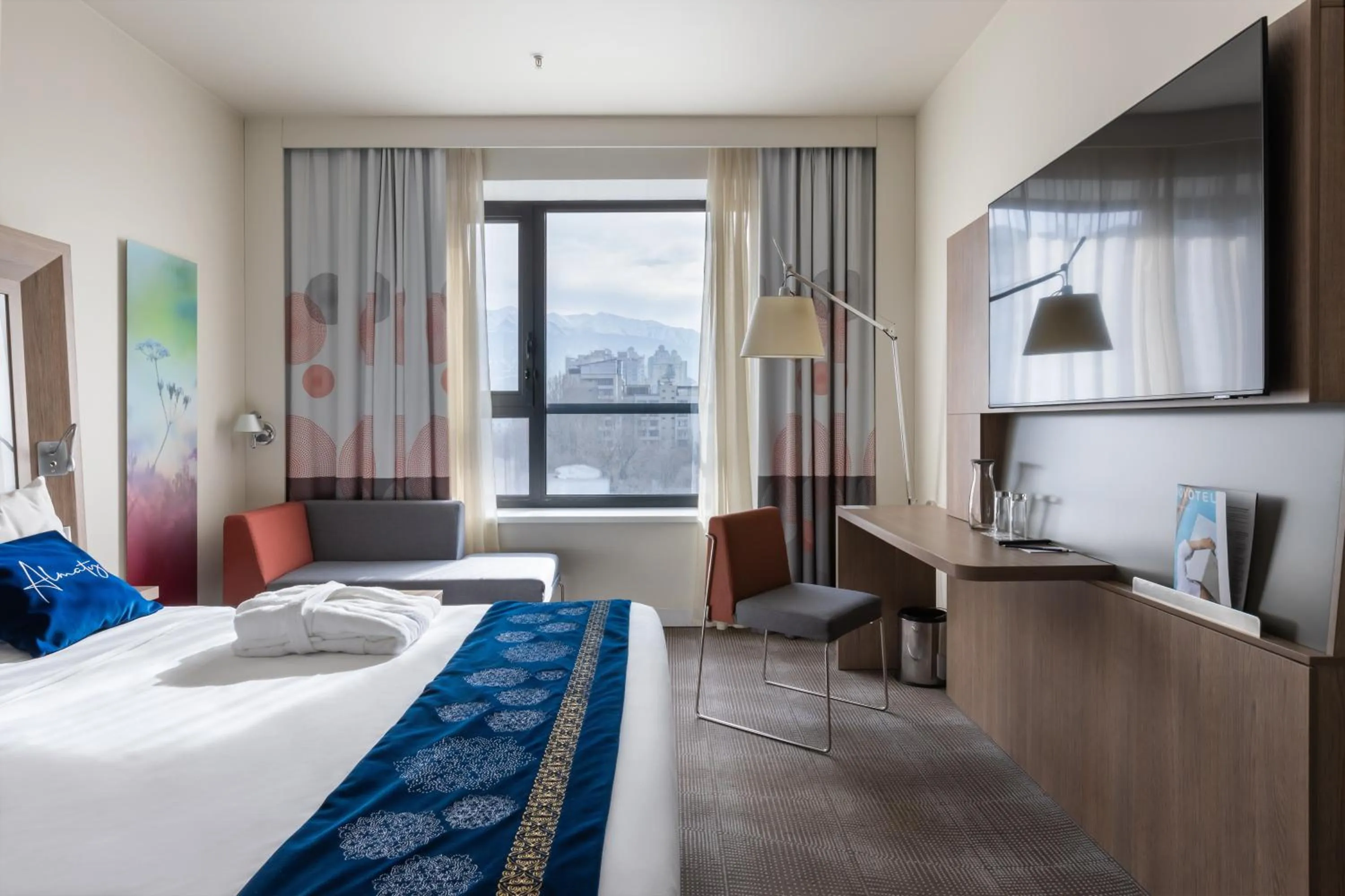 View (from property/room), Bed in Novotel Almaty City Center