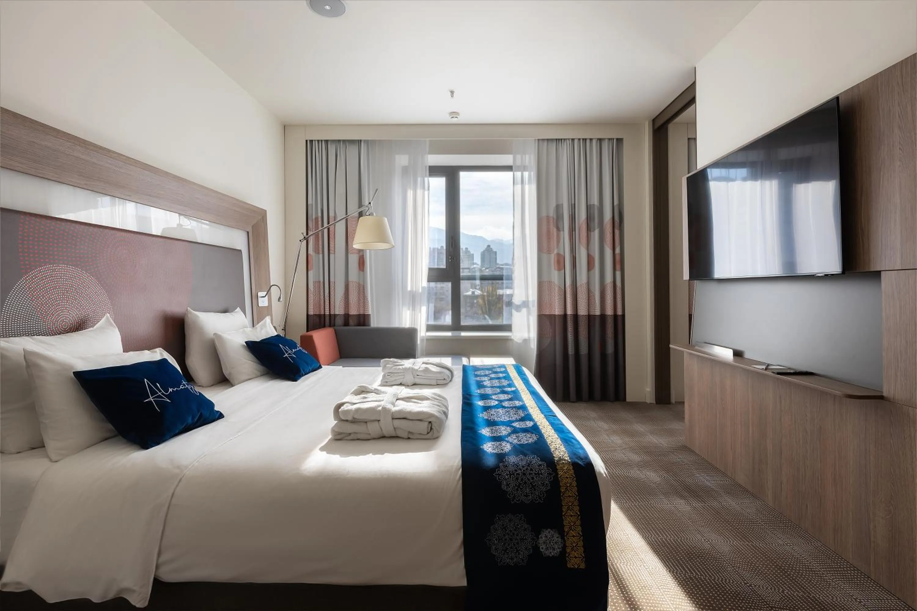 View (from property/room), Bed in Novotel Almaty City Center