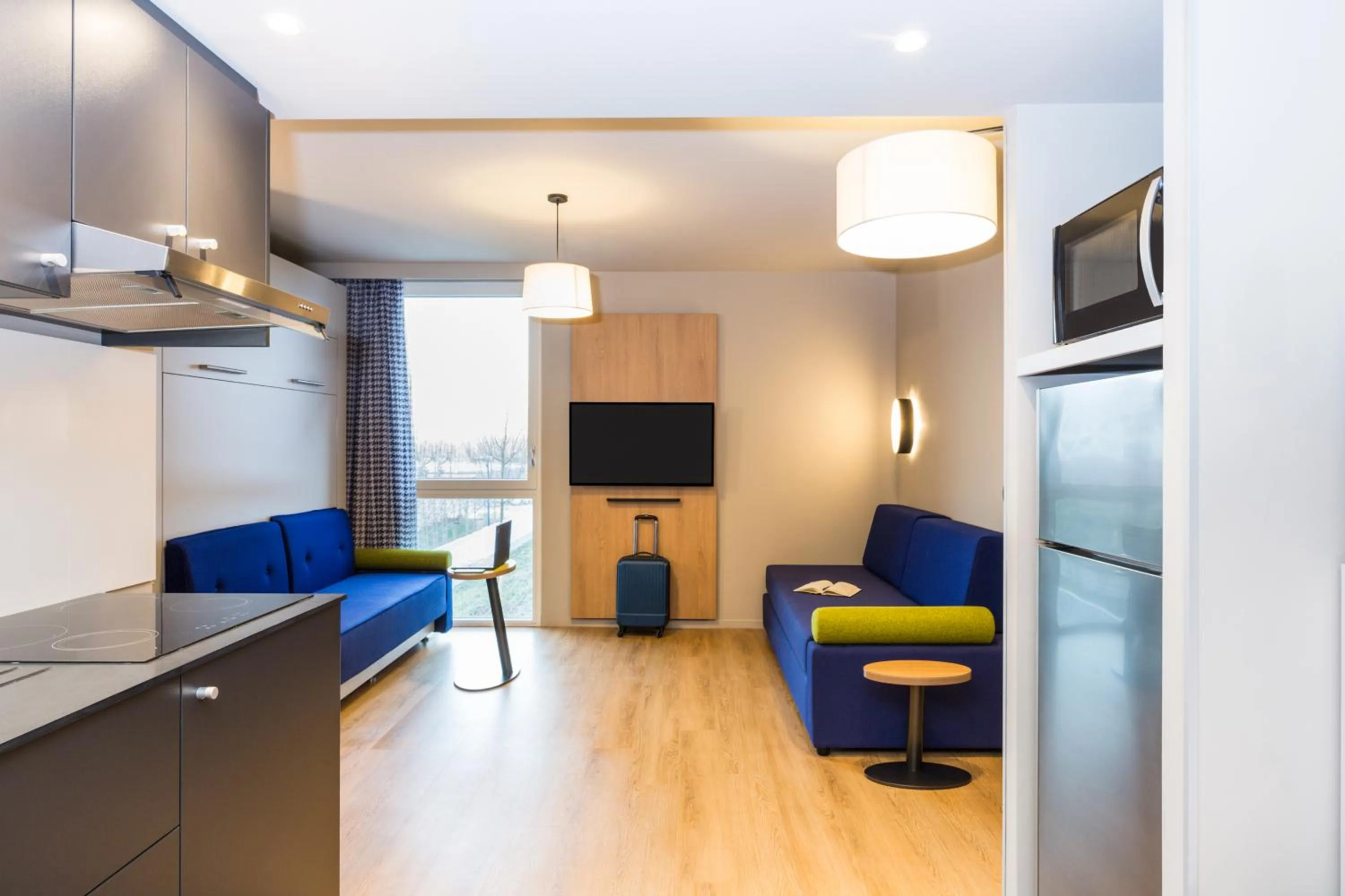 Kitchen or kitchenette in Aparthotel Adagio access Palaiseau Saclay