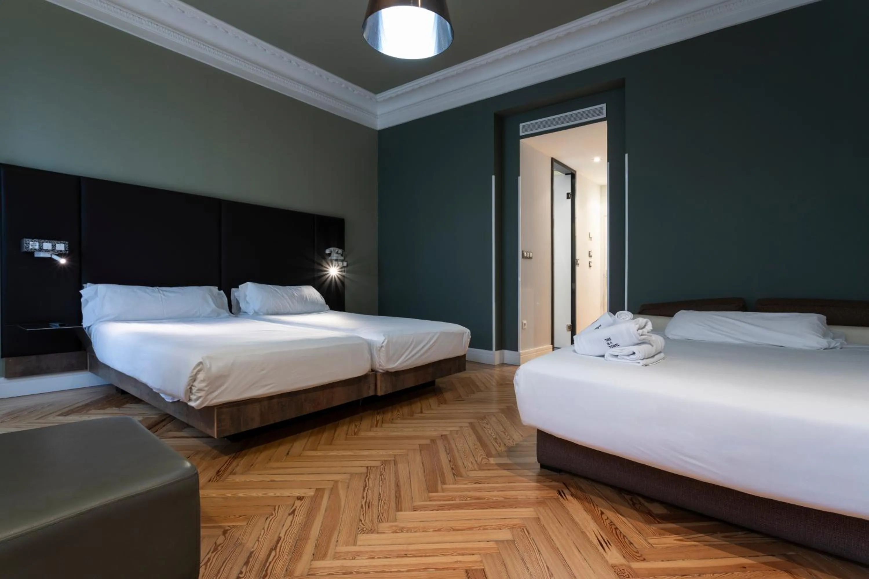 Bed in Petit Palace Lealtad Plaza