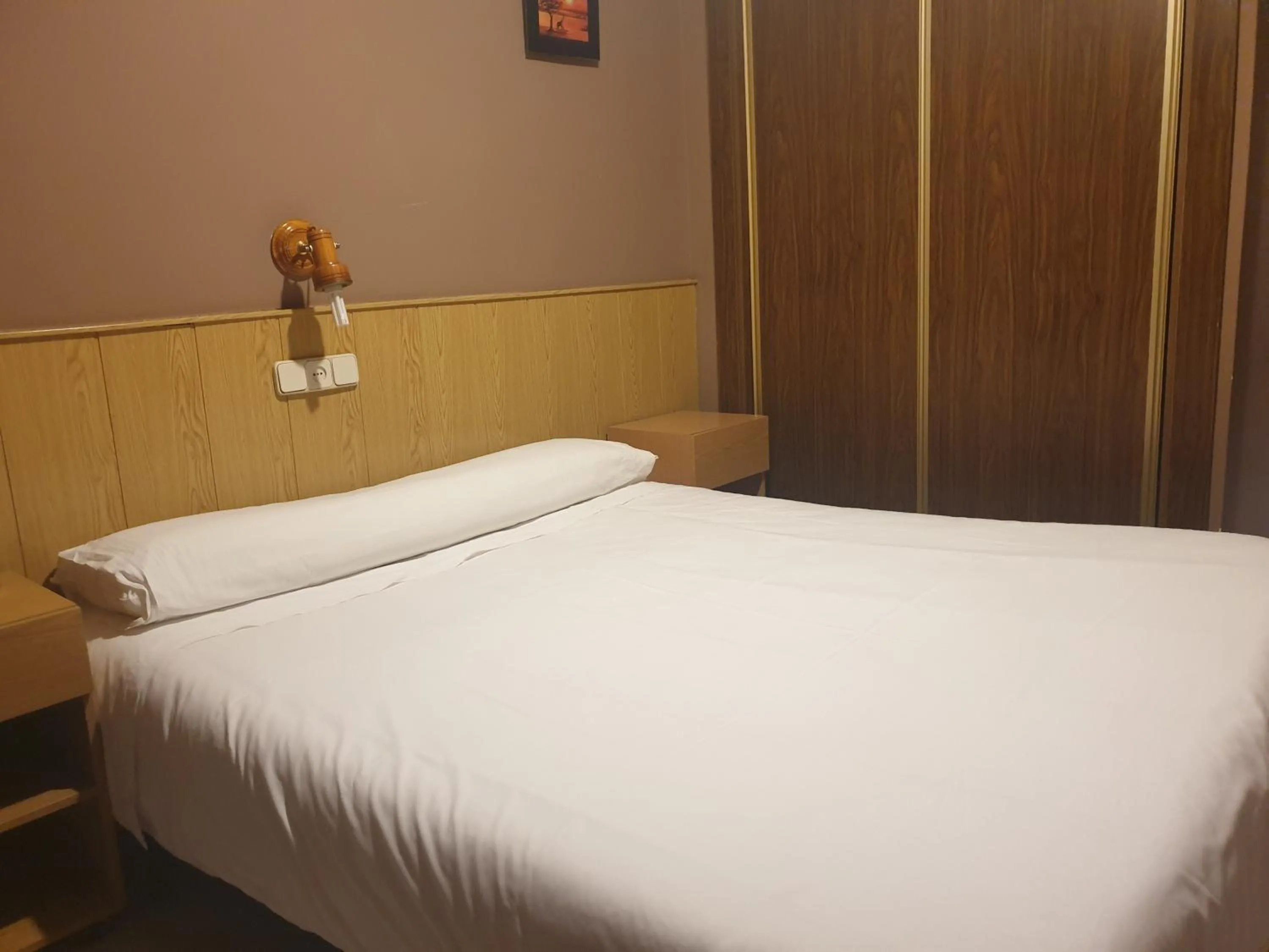 Bed in Hostal El Descanso