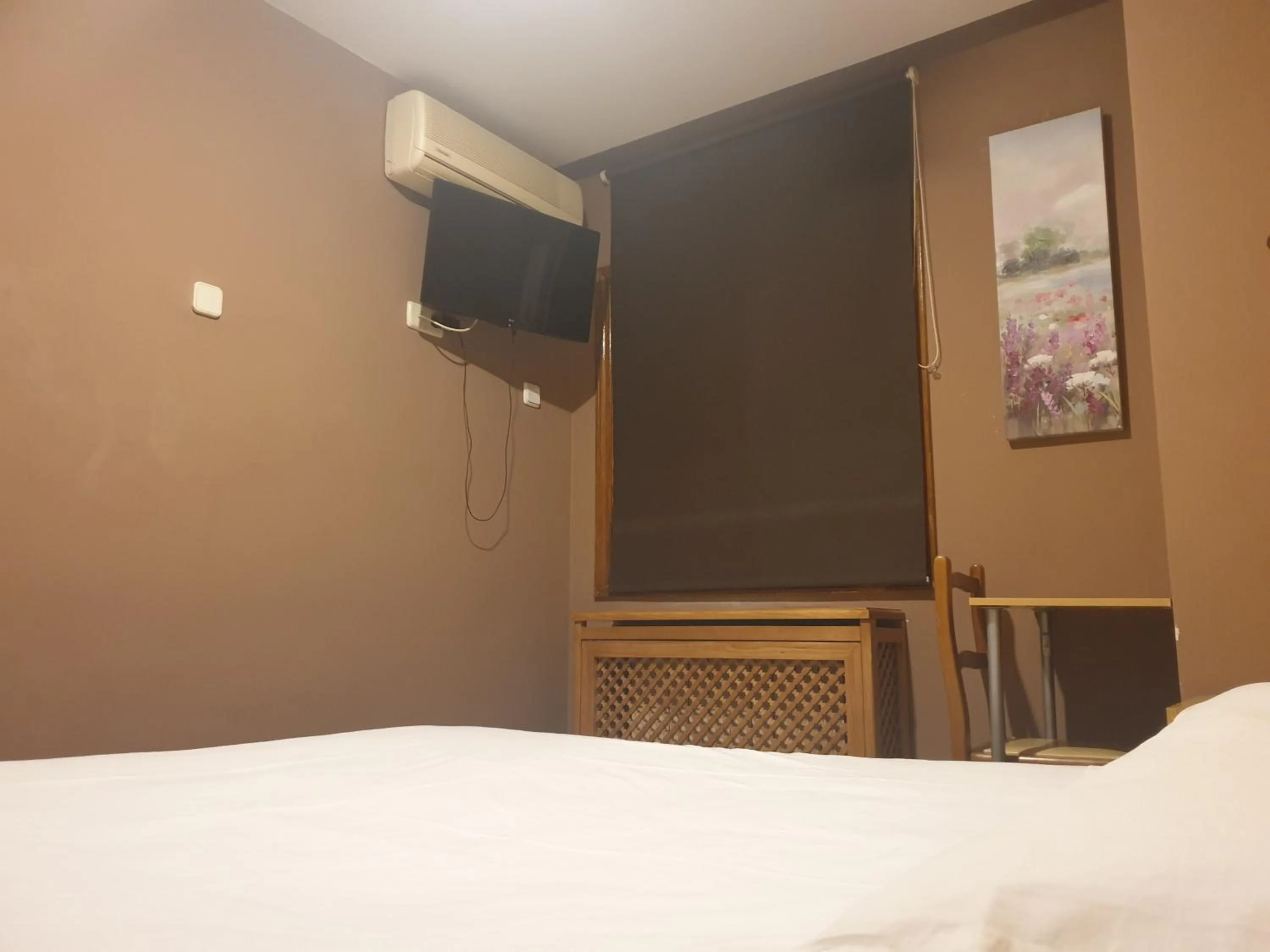 Bed in Hostal El Descanso