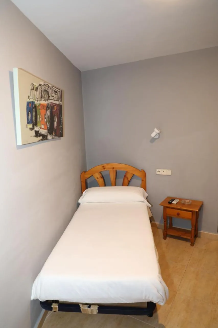 Bed in Hostal El Descanso